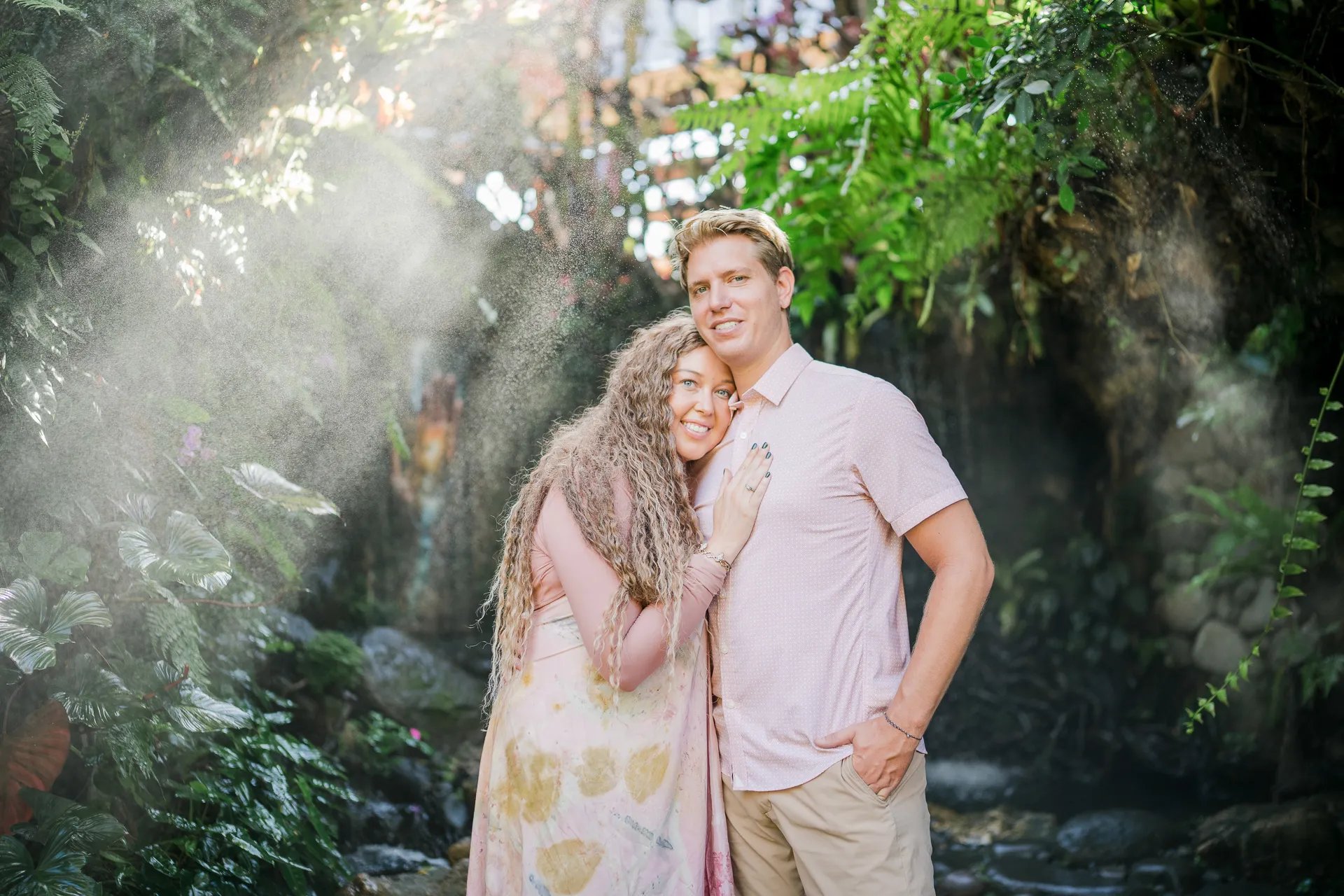Couple portrait at Umbul Sari Water Garden during a scenic family photography session in Bali
