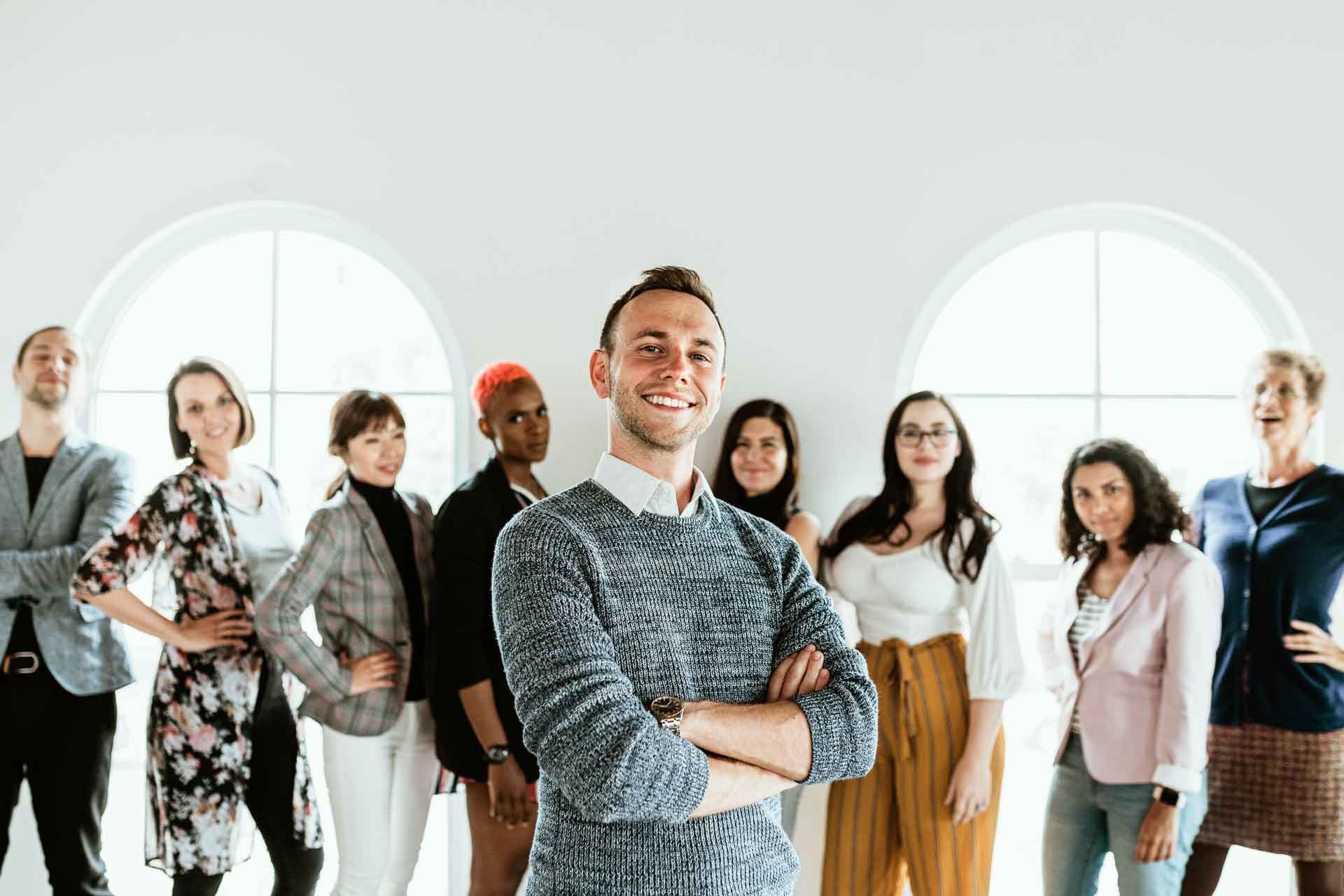 a man standing in front of a group of people