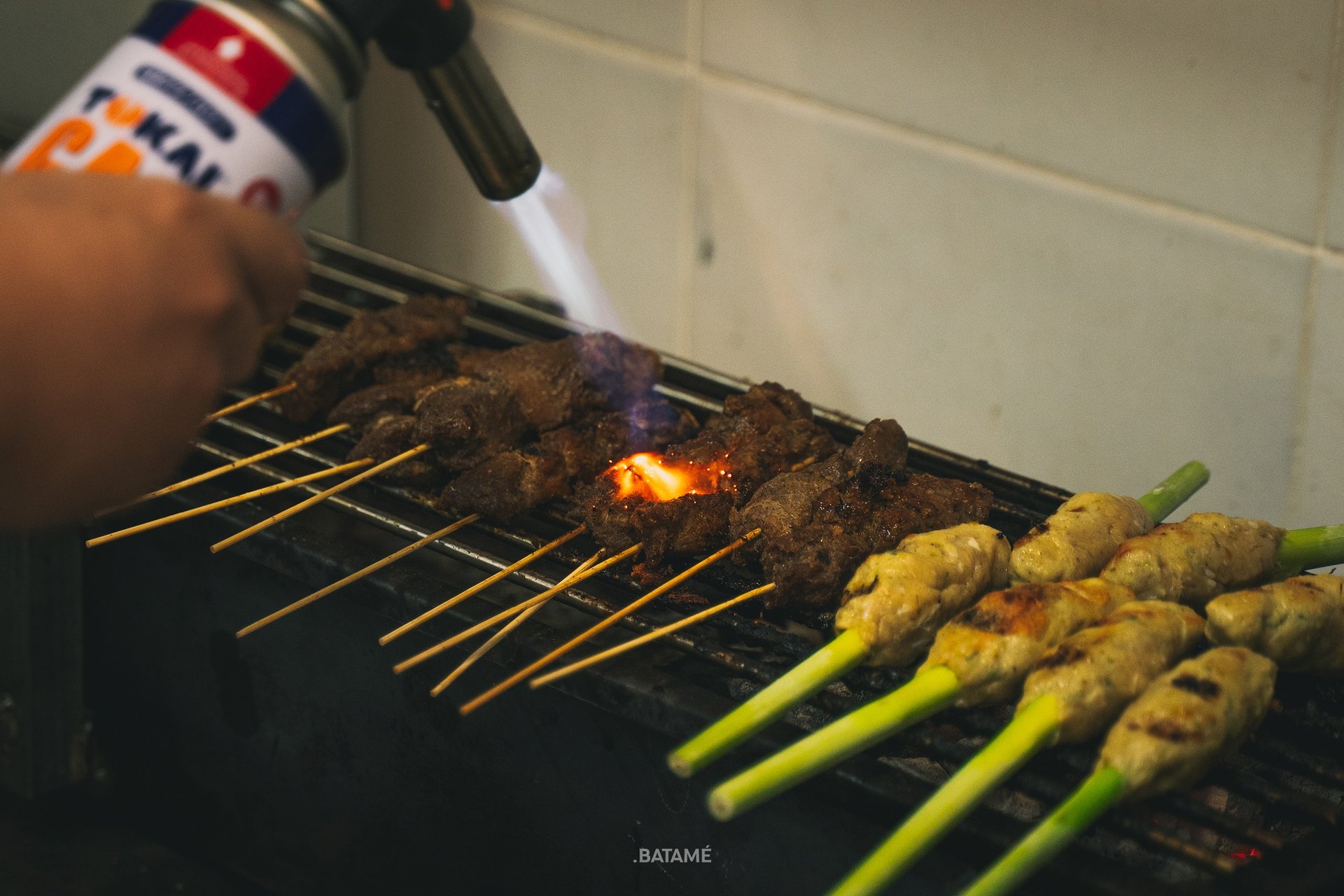 Pork Satay being torched on the griller at NUUD Batam