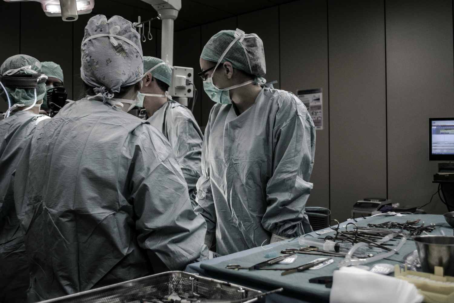 Board-certified plastic surgeon consulting with a patient at a modern Boise Idaho cosmetic surgery practice