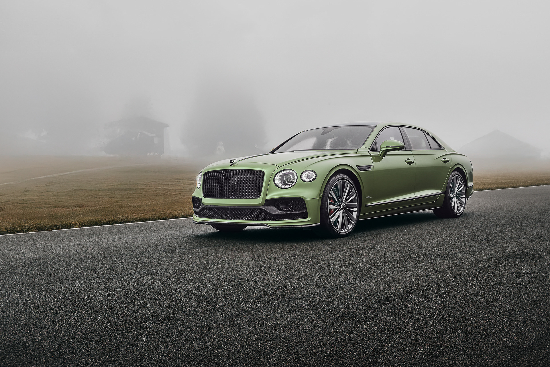 a green bentley flying spur speed