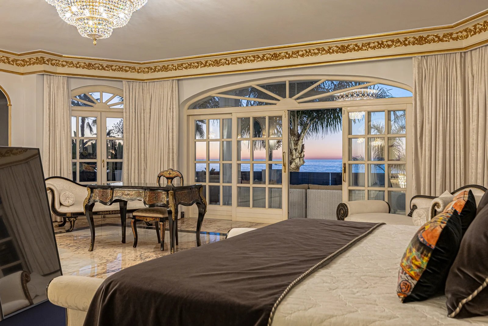 Master bedroom with terrace access in luxury coastal villa Marbella Spain