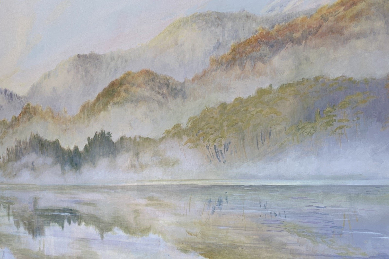 Hand-painted mural of a misty lake with trees and mountains reflected in calm water. Soft atmospheric landscape