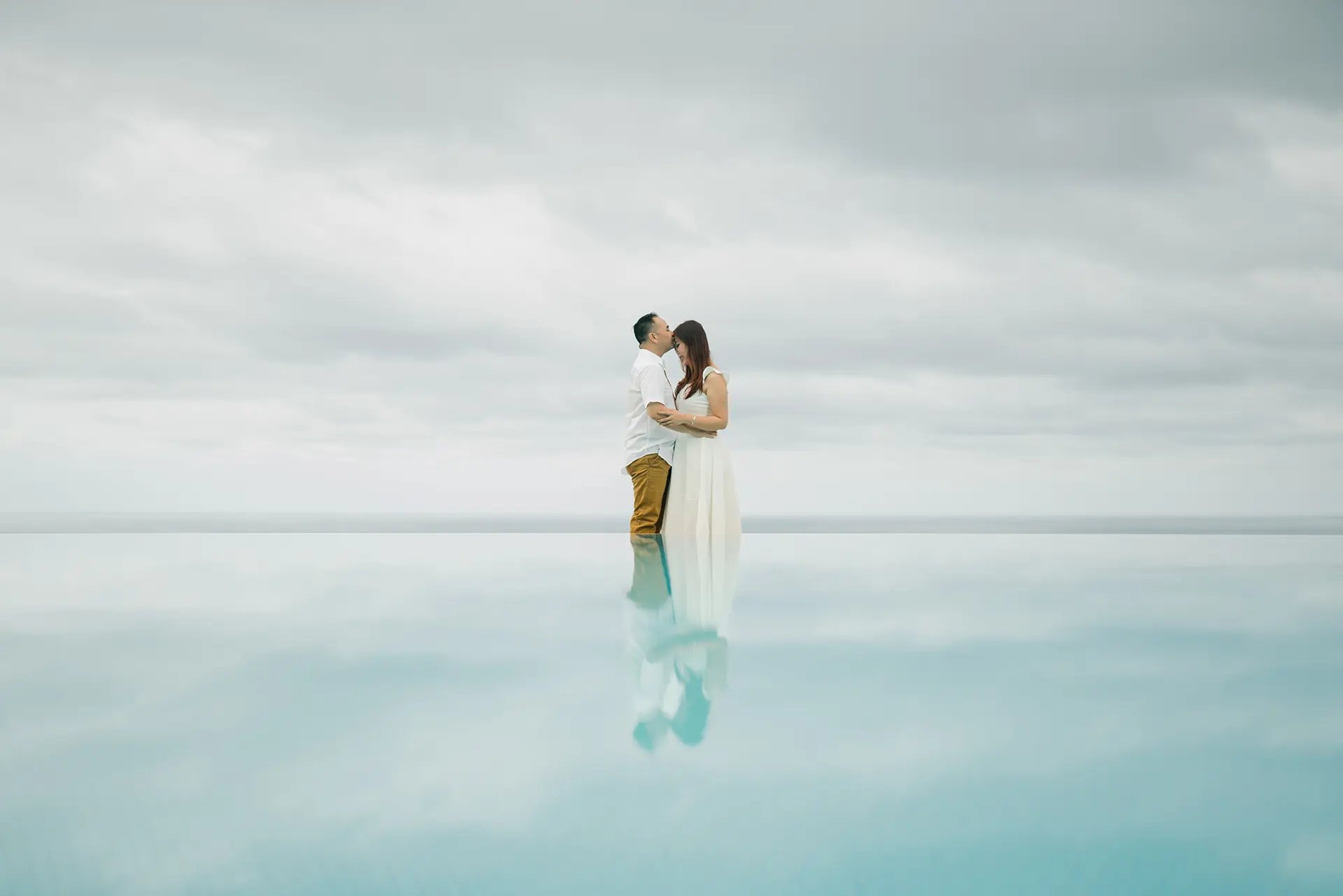Selly couple portrait with ocean view at Karma Kandara Uluwatu Bali  
