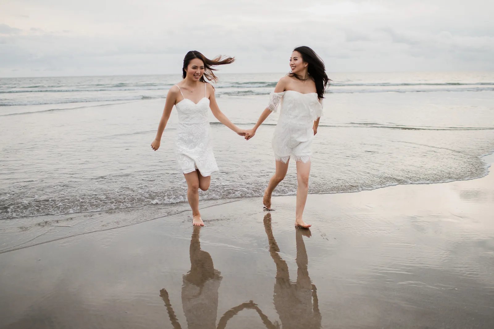 Janice family walking together during a beach photography session at Indigo Seminyak Bali