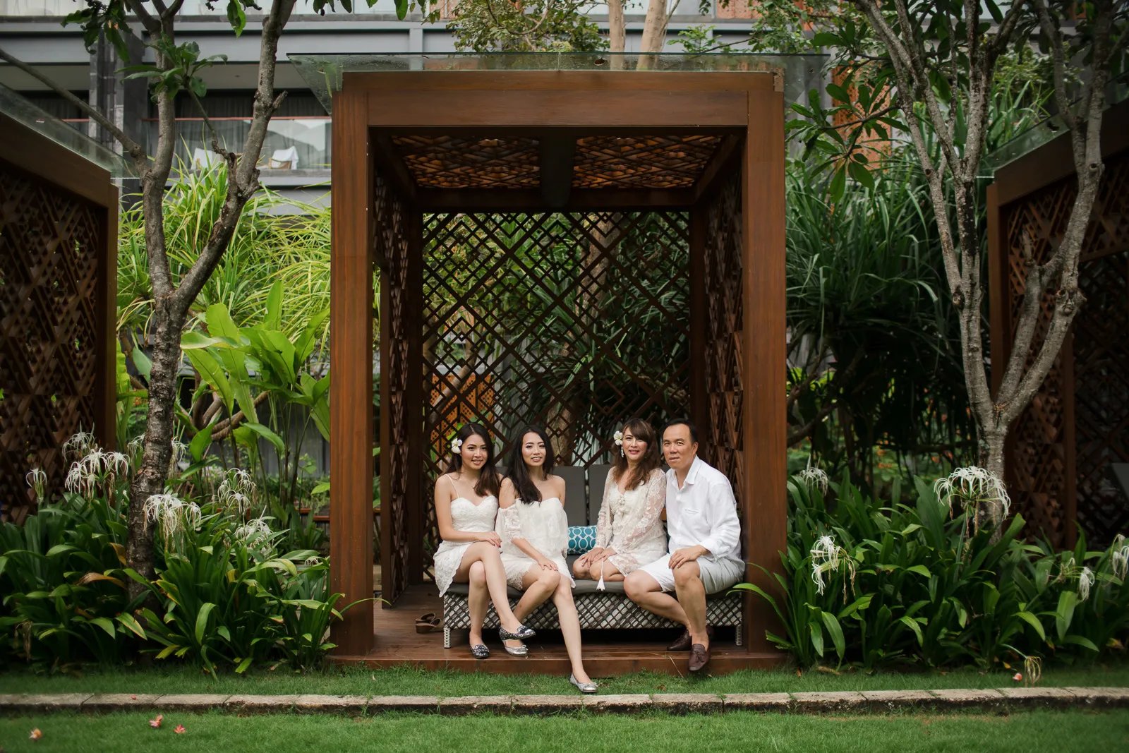 Janice family portrait at Indigo Seminyak Bali surrounded by tropical garden scenery