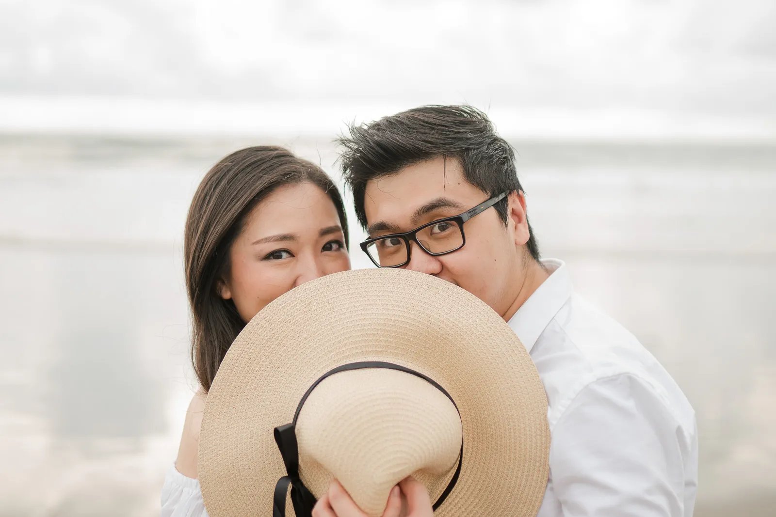Intimate couple portrait at Seminyak Beach Bali during elegant and natural multigeneration family session.