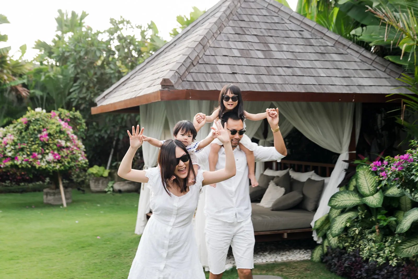 Family portrait at a tropical private villa in Seminyak Bali.