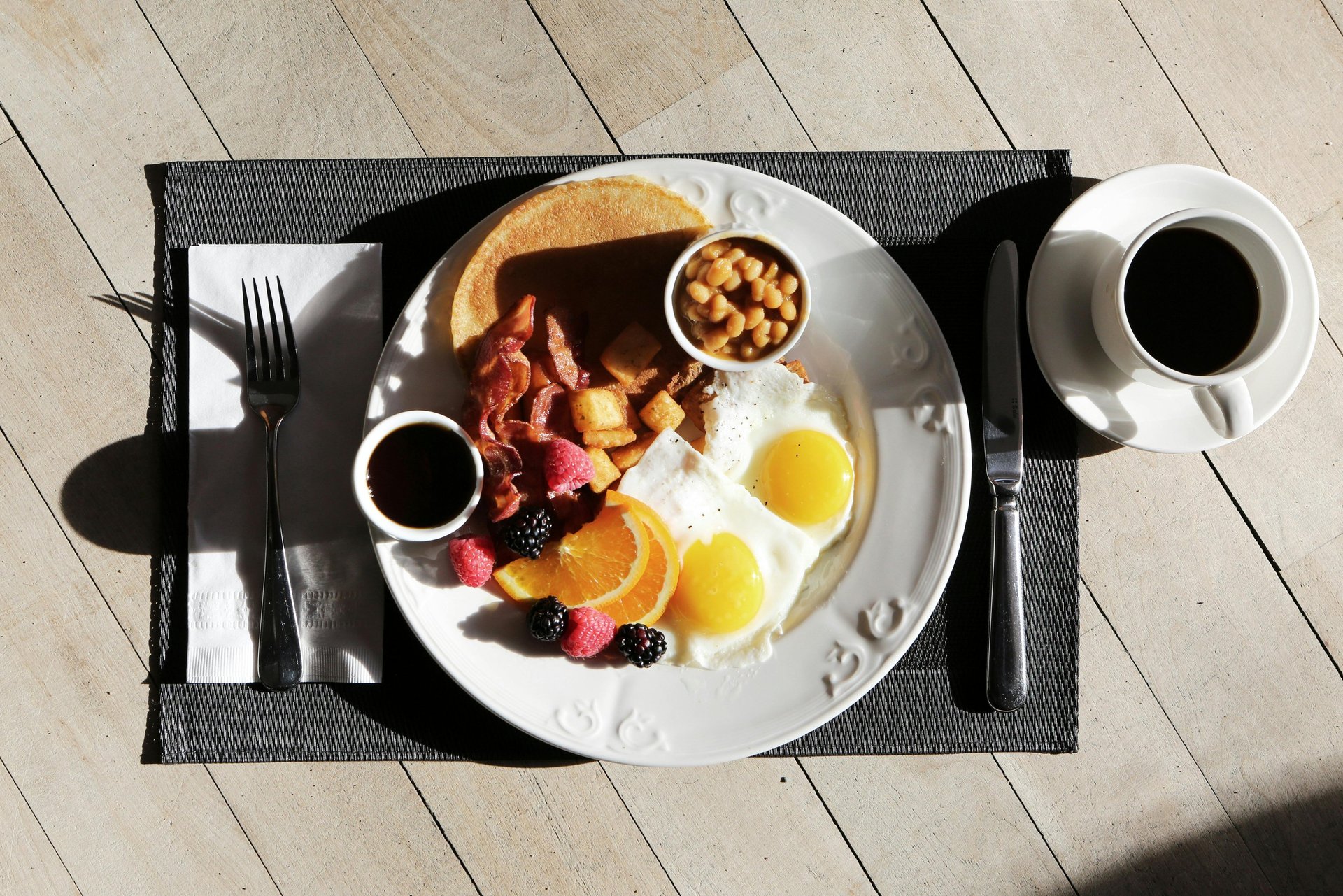 a breakfast plate with eggs, toasted eggs, and toasted eggs