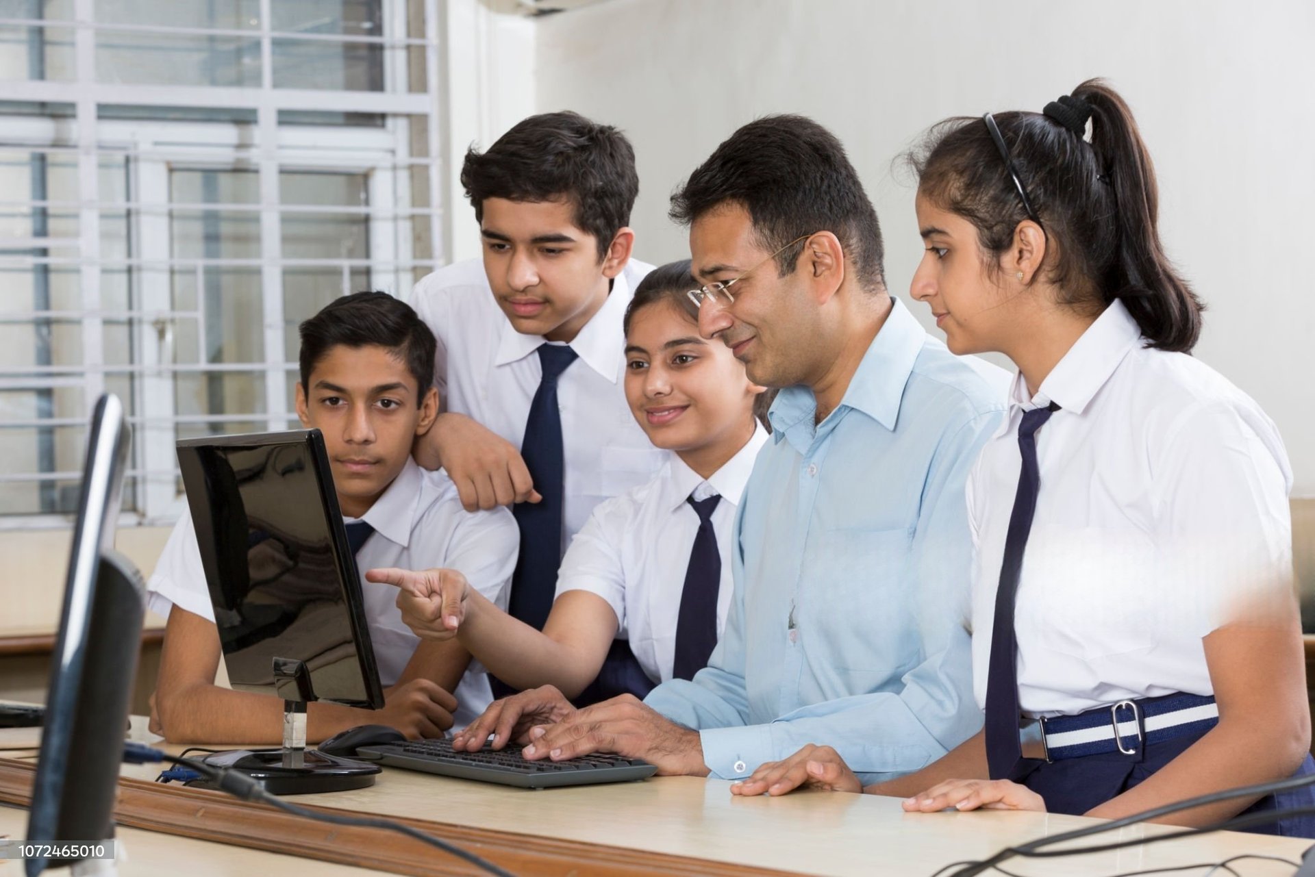 Student Learning Computer at Smart Village Computer Hub