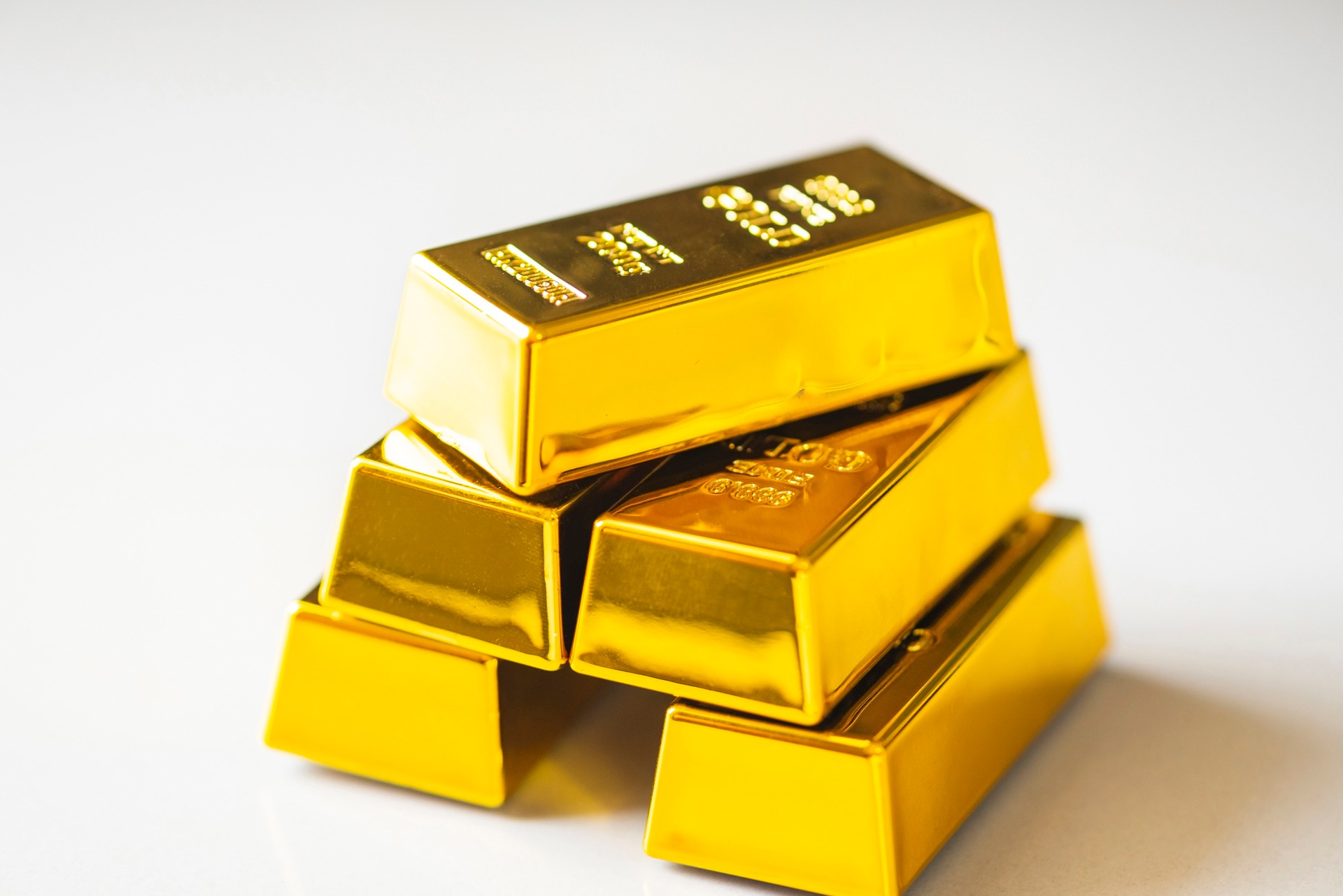 gold bullion bars in a pyramid