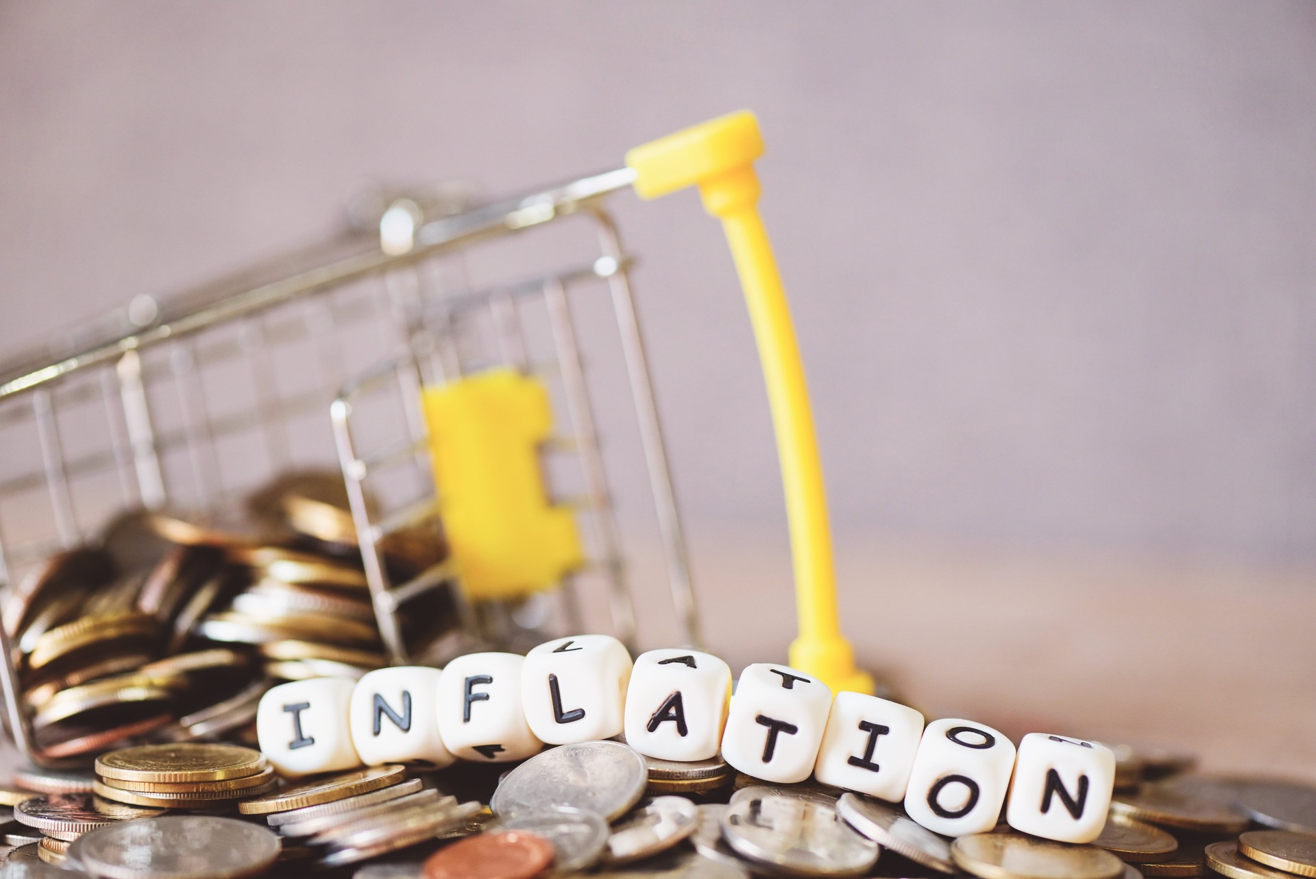 grocery cart falling over due to inflation and costs
