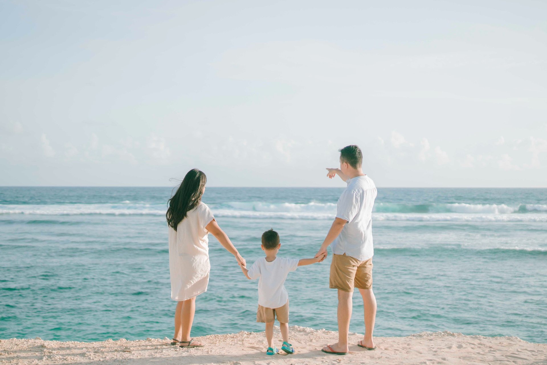 family photography session at Melasti Beach Bali with ocean backdrop