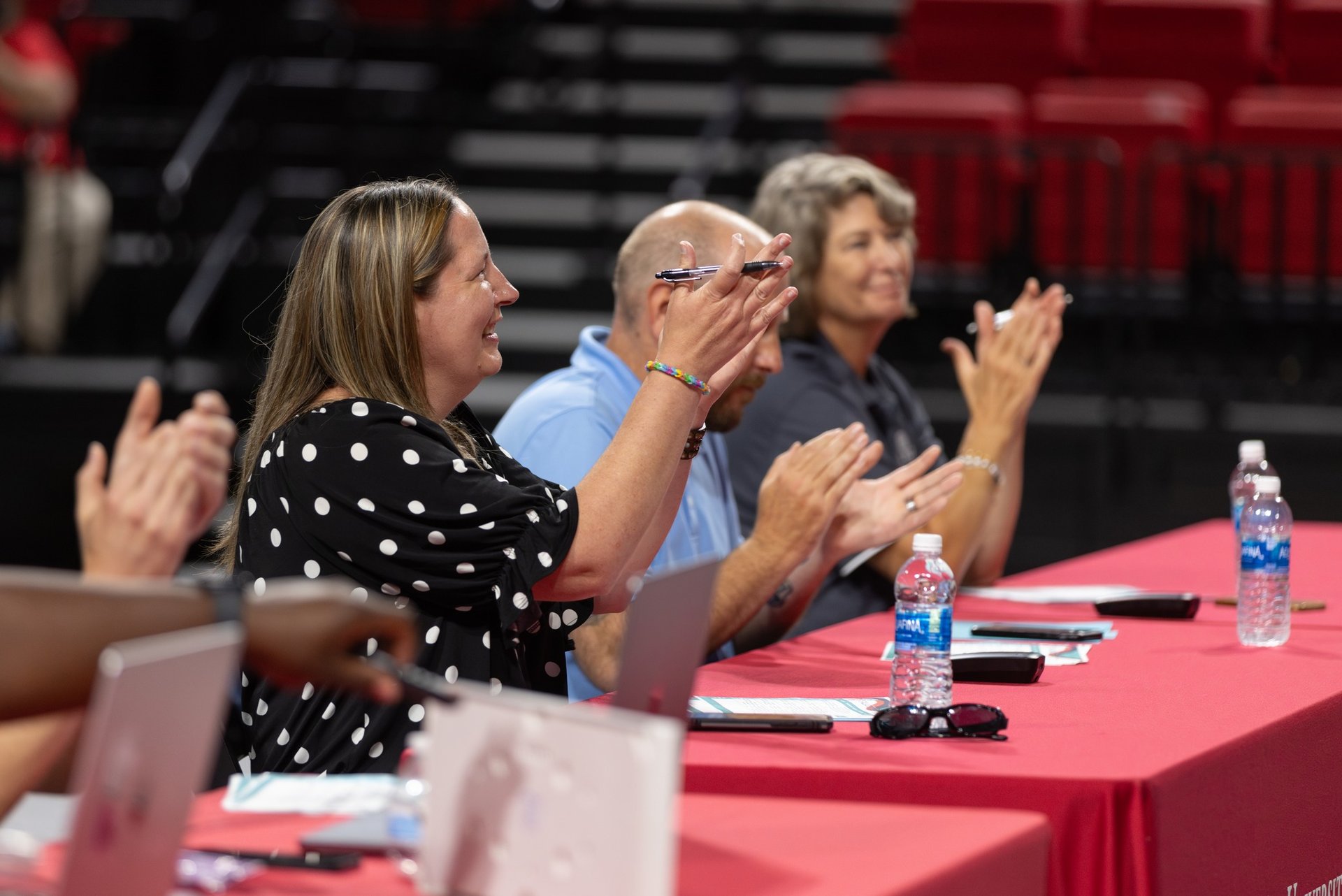 judges applaud students after a main stage presentation