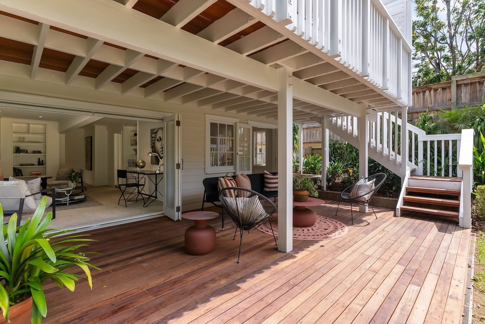 Home extension in Remuera by Qualitas Builders, Auckland - modern deck with white supports for balcony