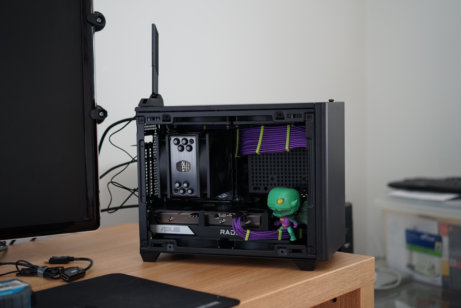 a computer case with a green alien in the middle