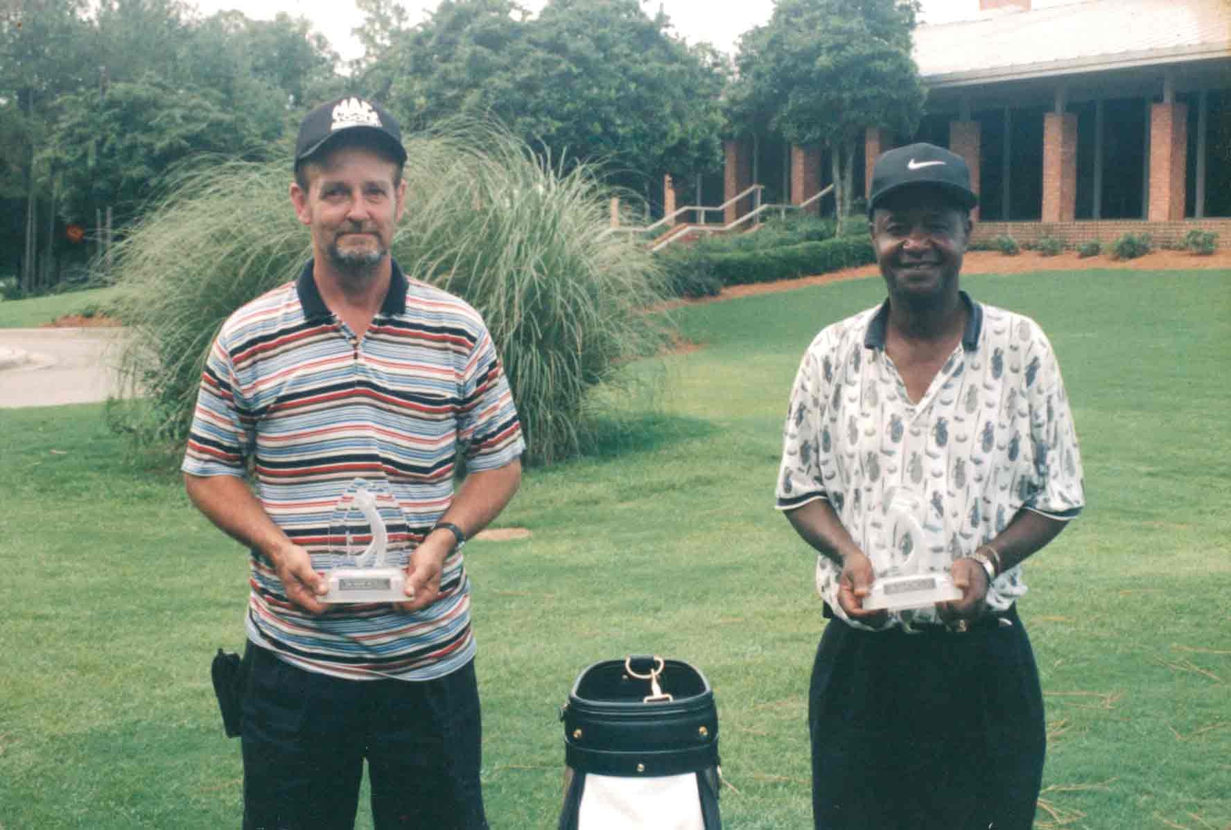 Par Four Golf Club image of two golf winners