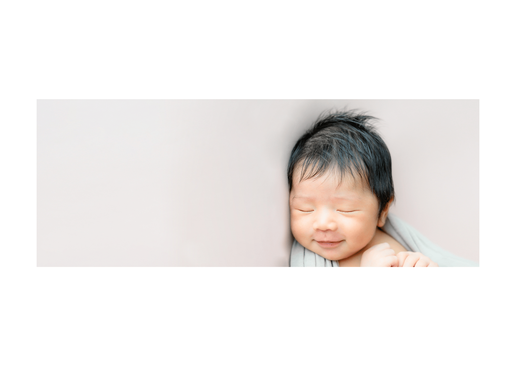 Gorgeous baby sleeping with a smile