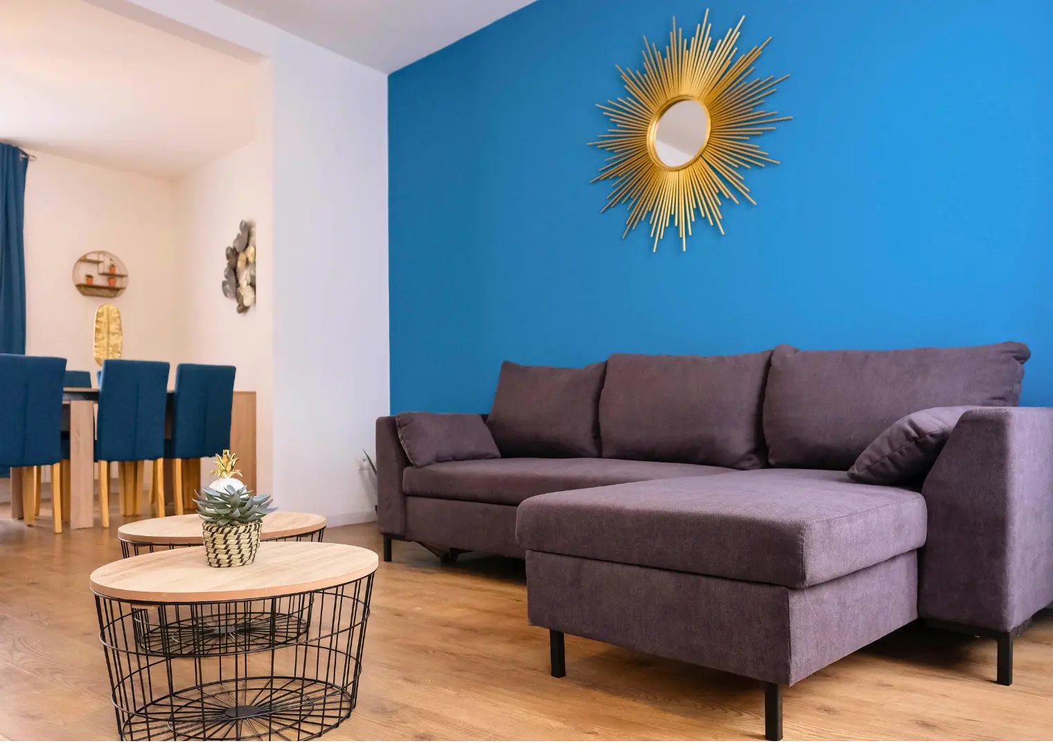 Bright living room with corner sofa, serviced accommodation for business stays