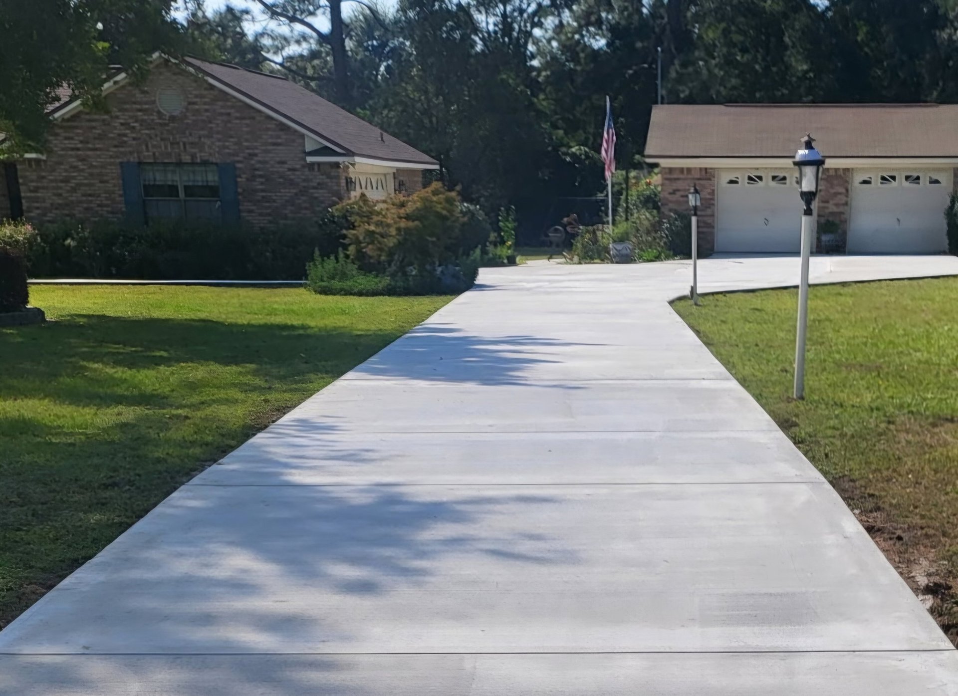 Concrete driveway installation in Pensacola FL with smooth finish and clean edges