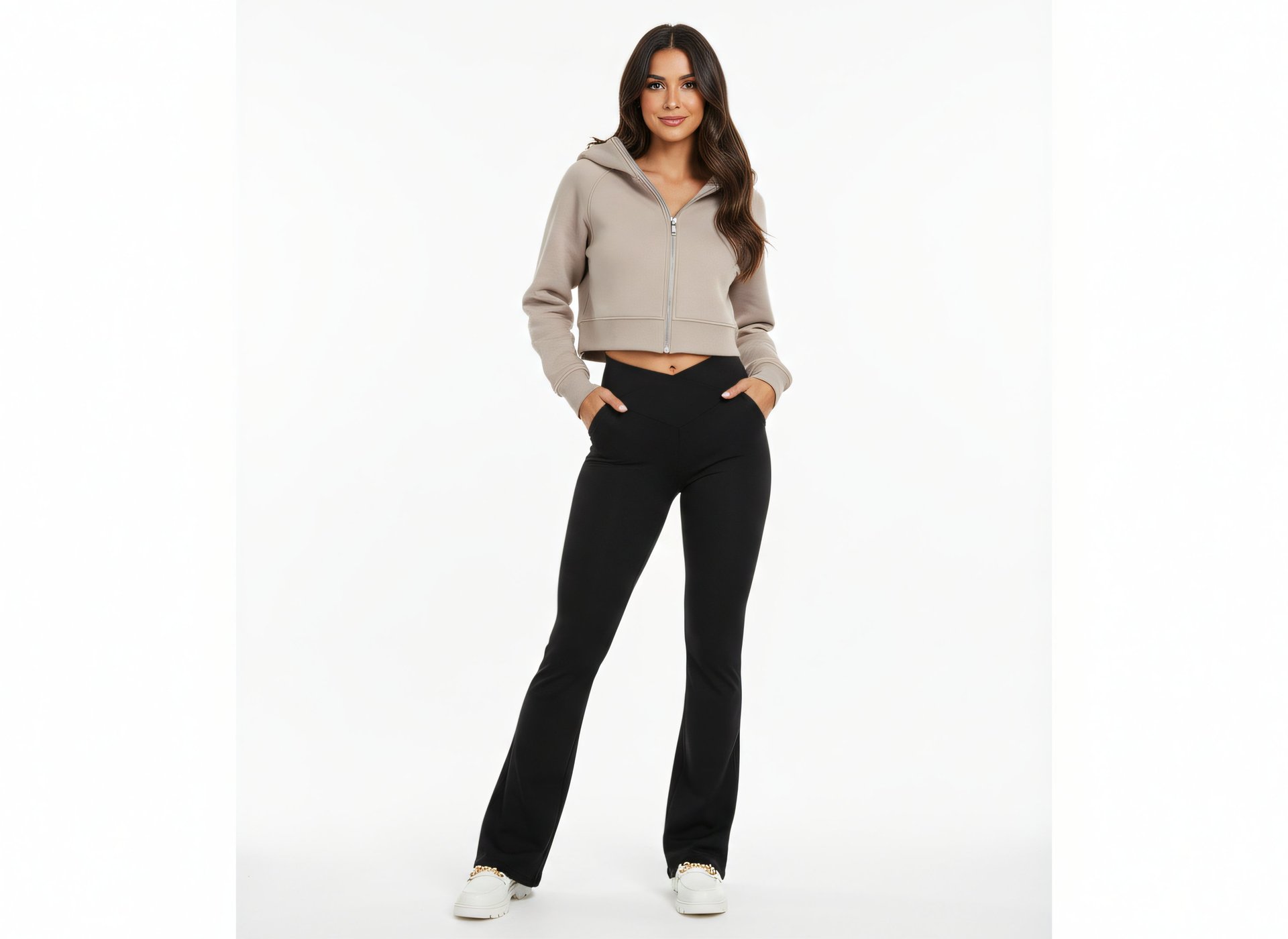 a woman in a cropped hoodie and legging