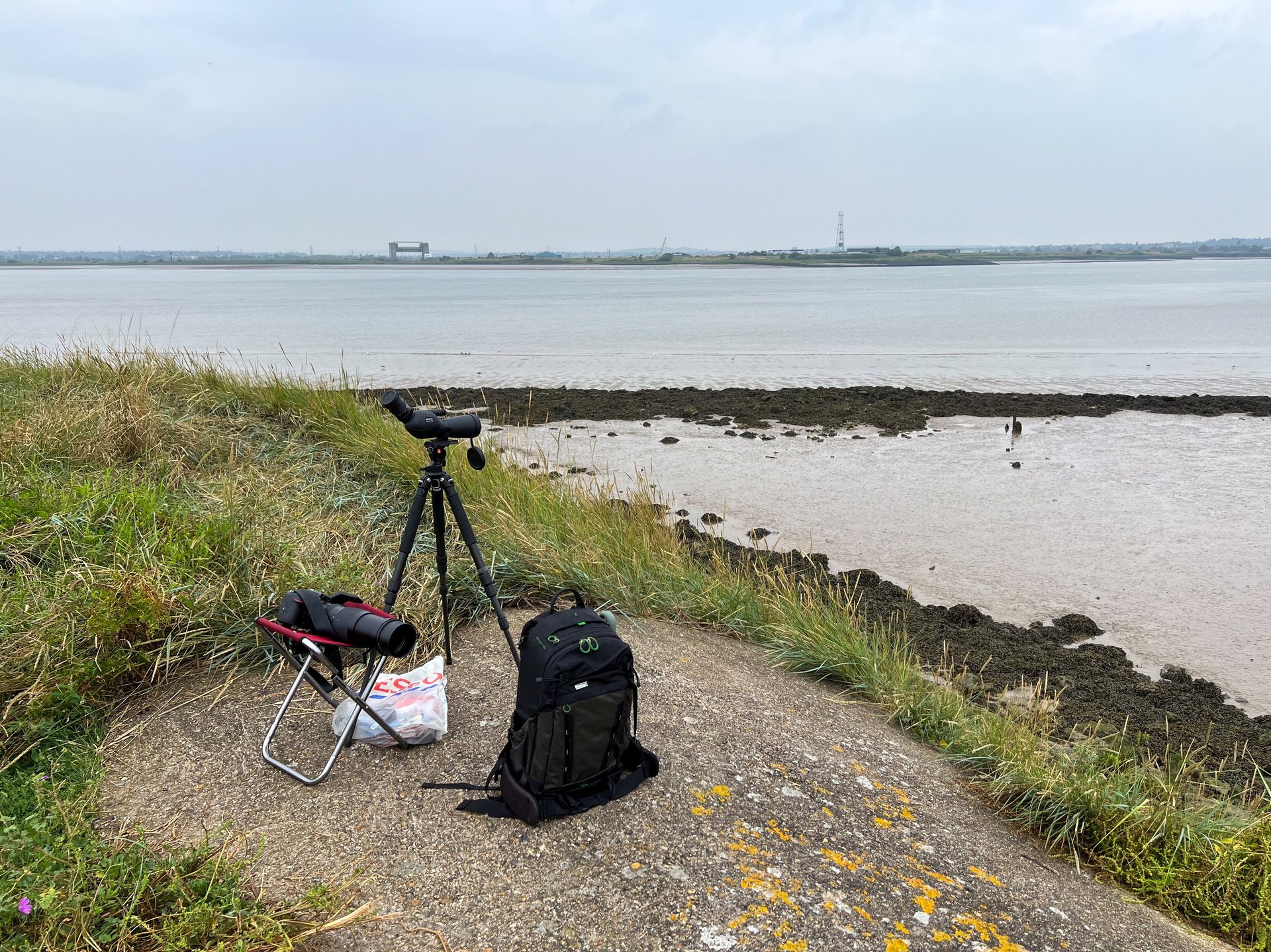 Essential urban birdwatching equipment at the Thames; camera, tripod, scope, bag, chair and lunch.