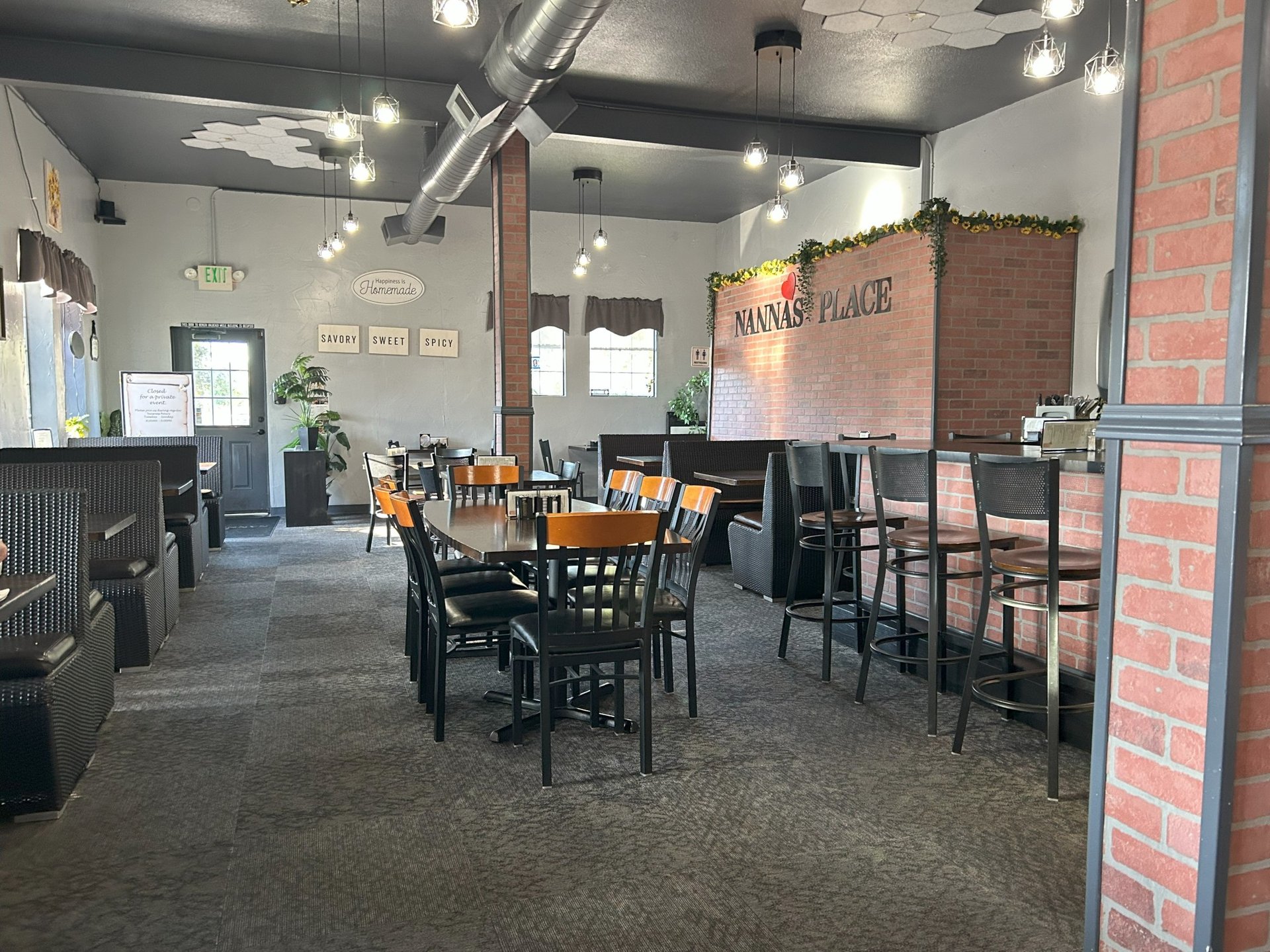 Nanna's Place restaurant interior with a brick wall