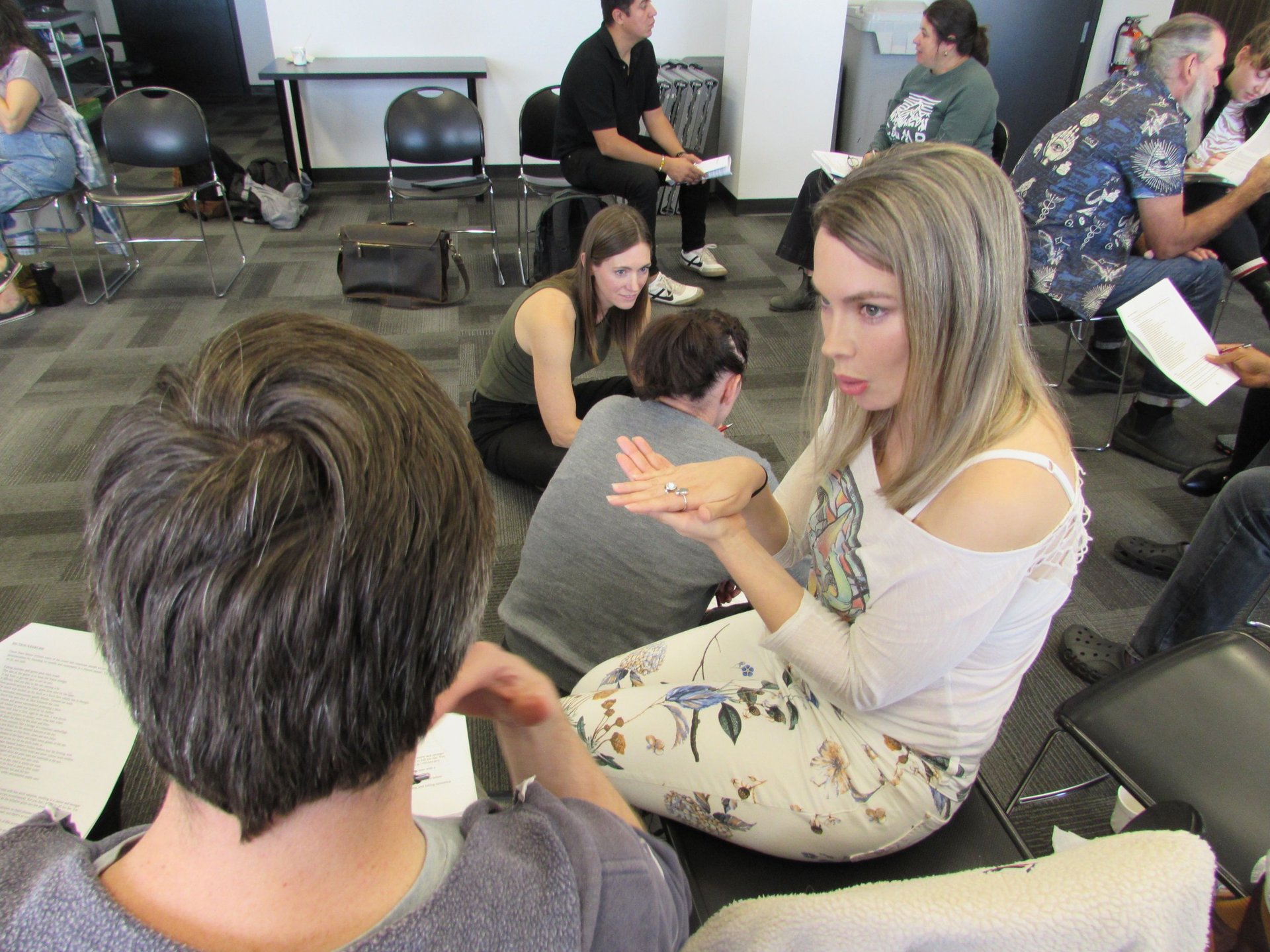 Accent coach coaching client in workshop