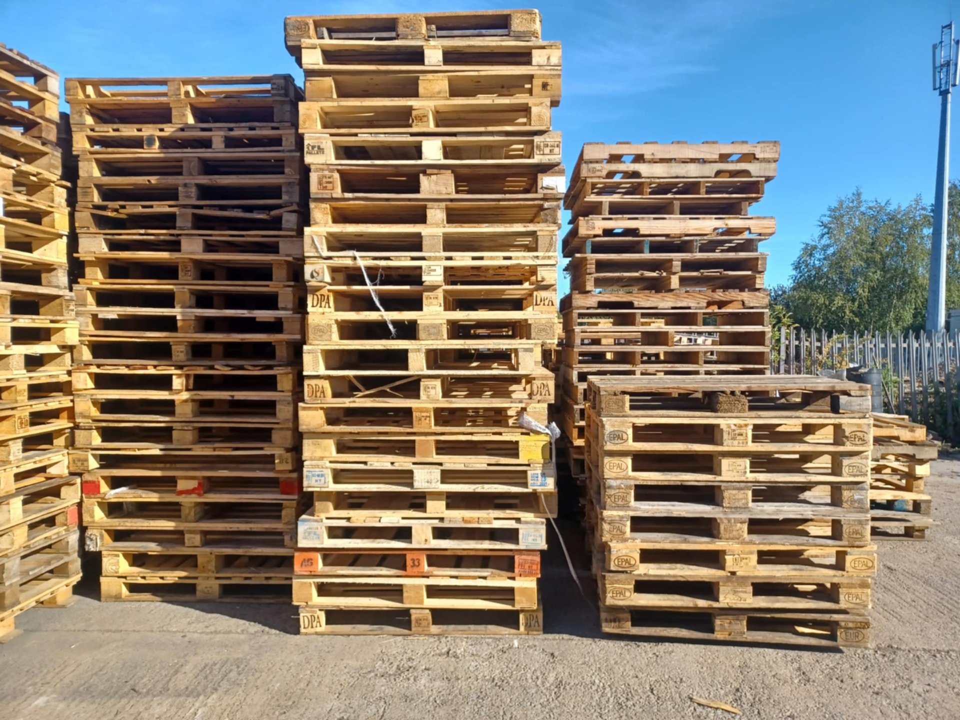 Pallets stacked up needing repair