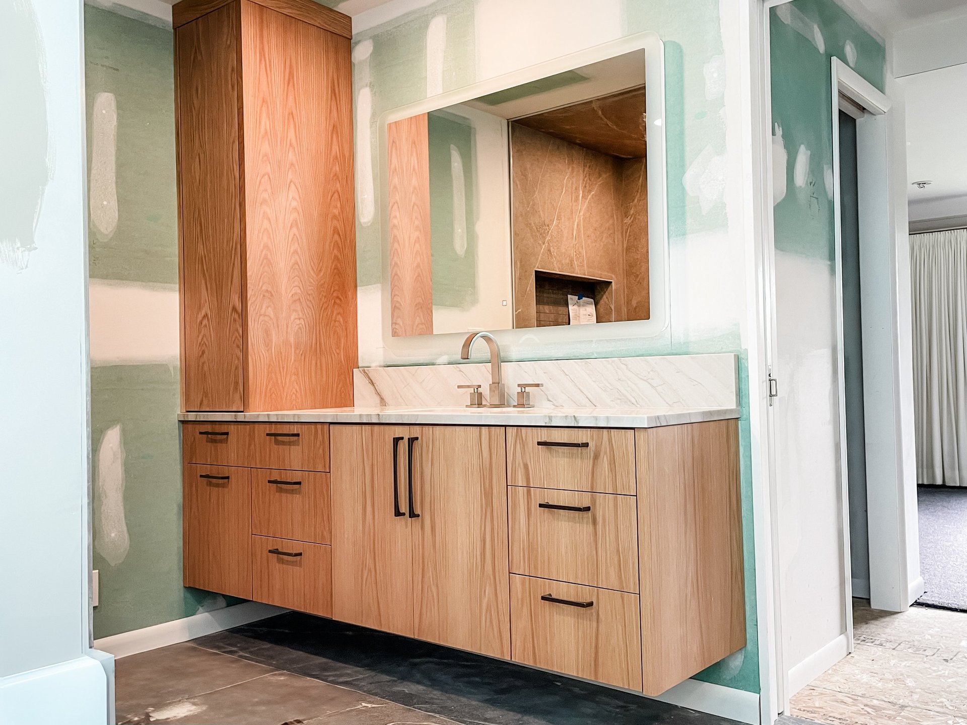 Unusually shaped custom built bathroom vanity for a Pearce Woodworks Detroit client.