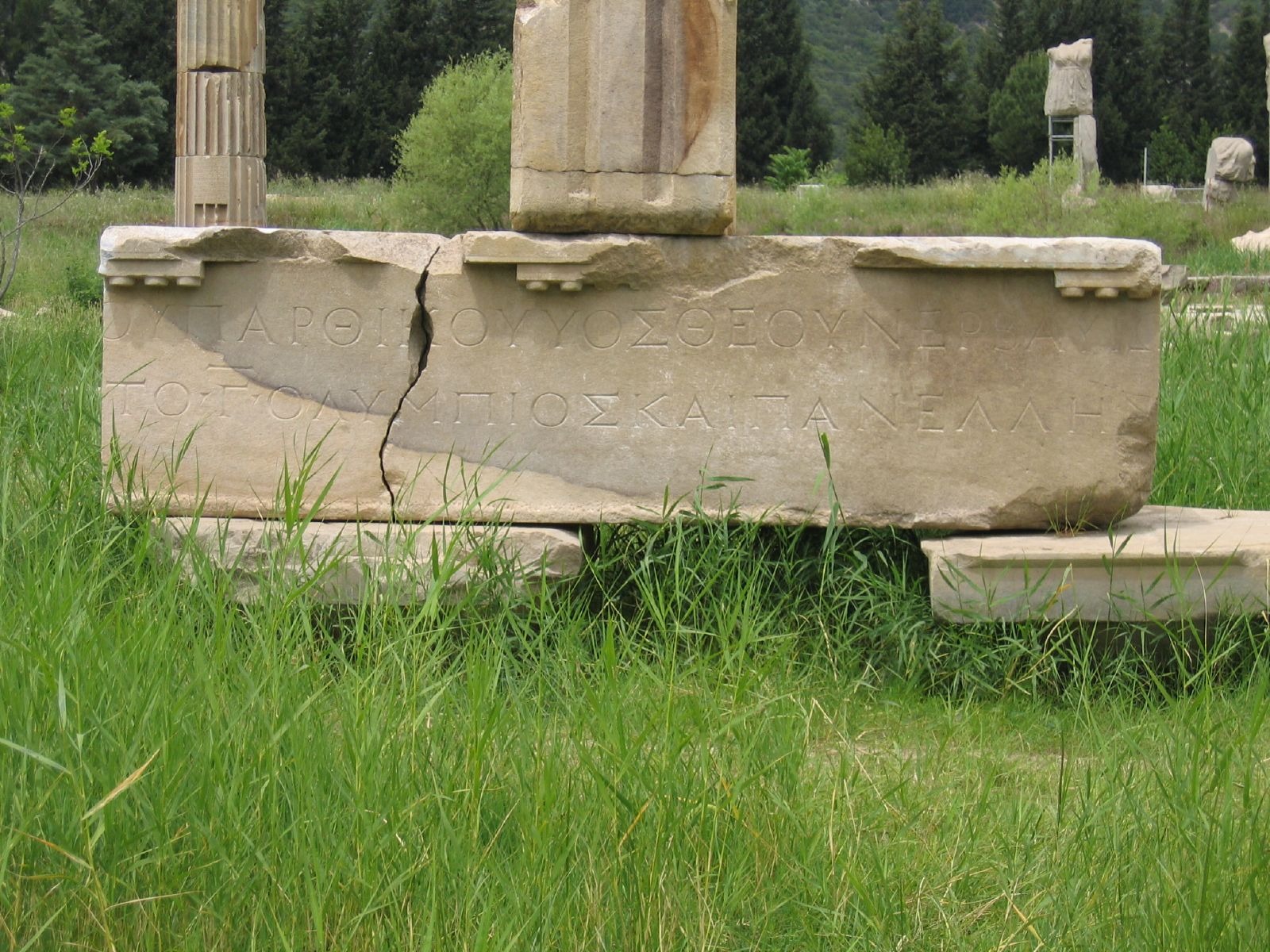 Remains of stone inscriptions found on a cracked marble slab in the ancient city of Erythrai.