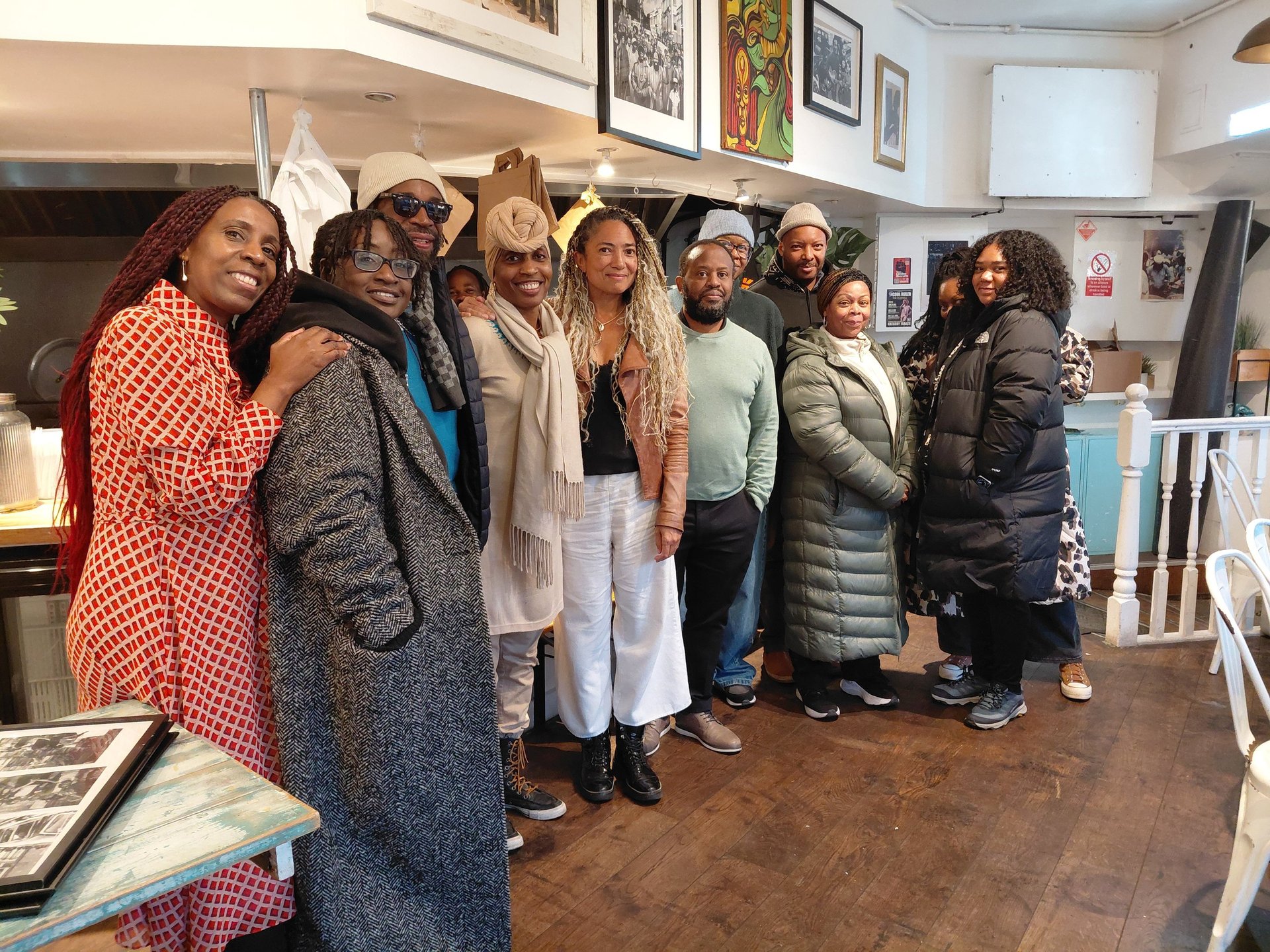 a group of people standing in the Portobello Shack