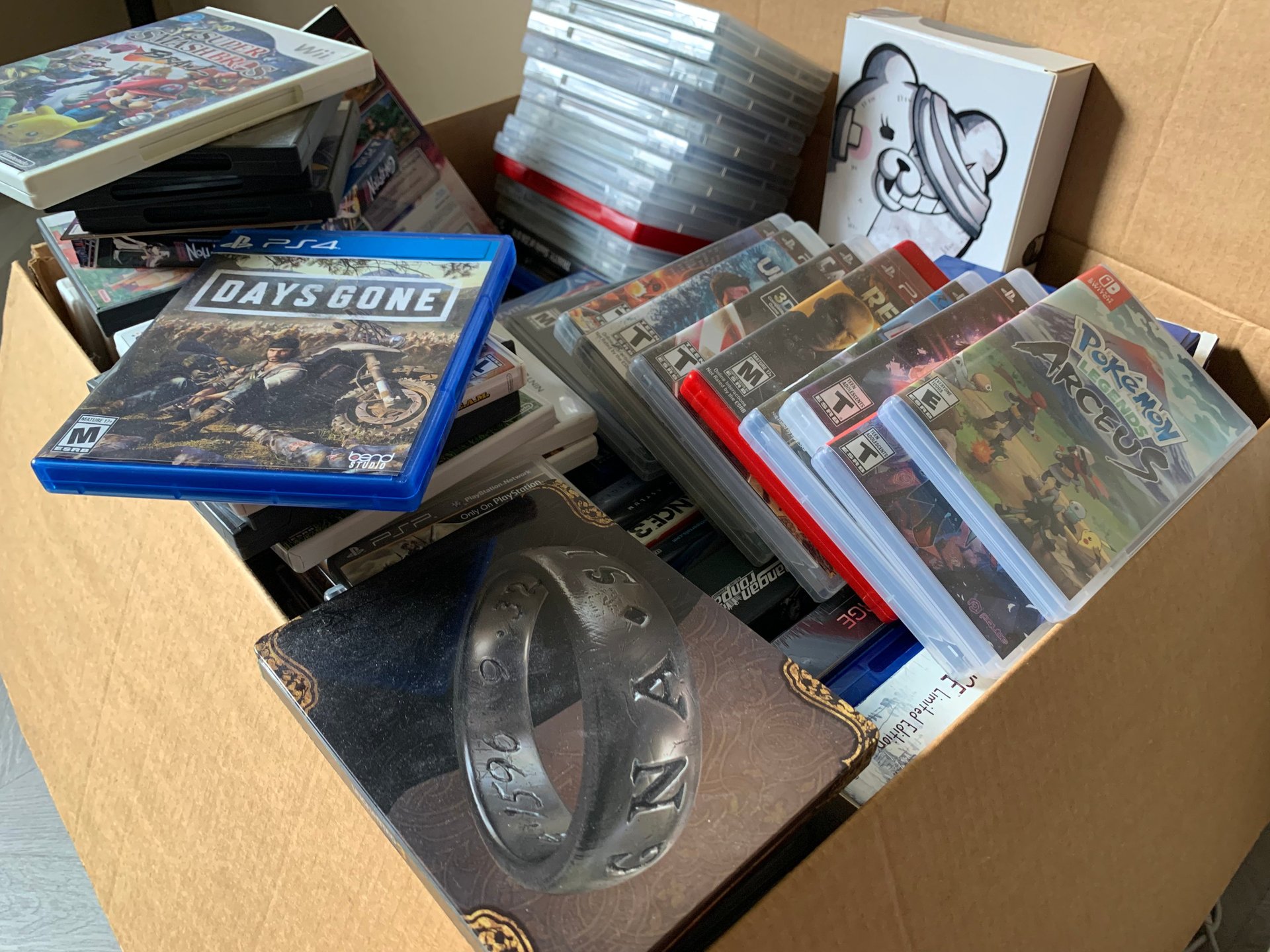 Backlog box full of video games.