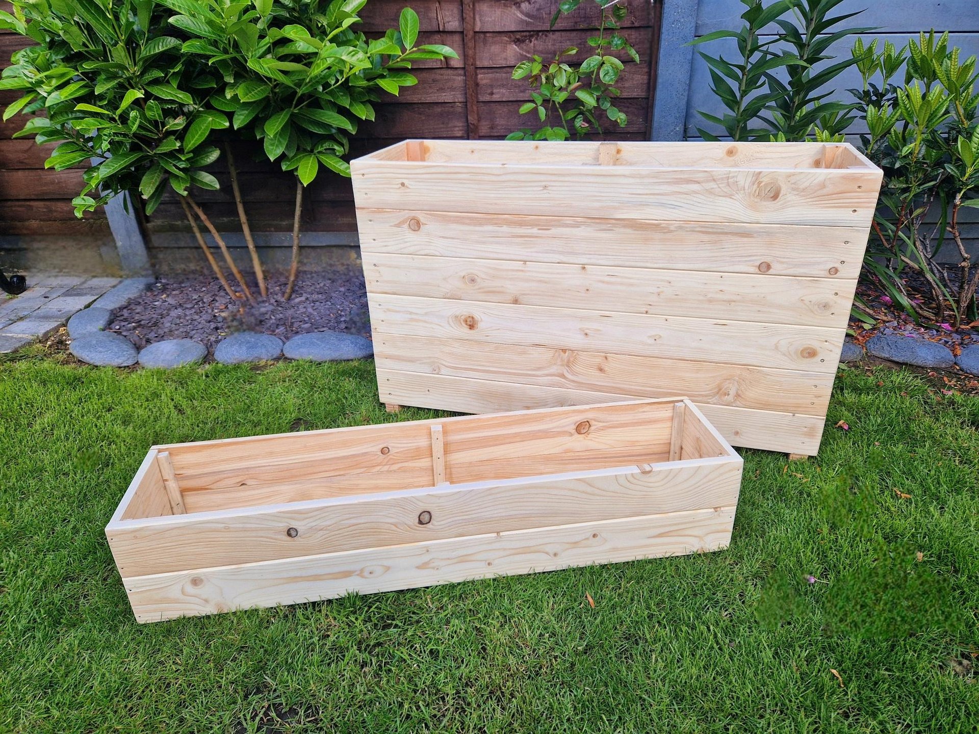 quality planters and plant boxes made from solid wood handmade in uk large and tall wooden troughs
