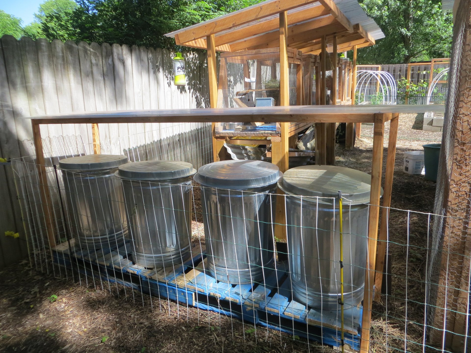 Garbage cans under new cover