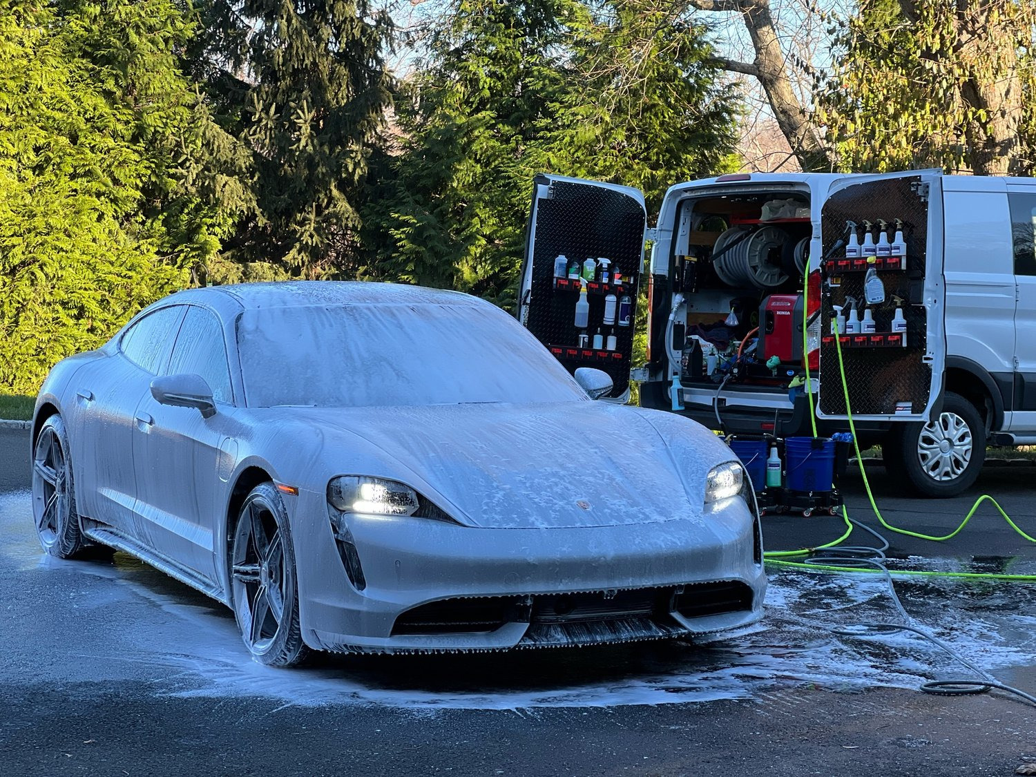 Mobile Auto Car Detailing In A Drive Way 