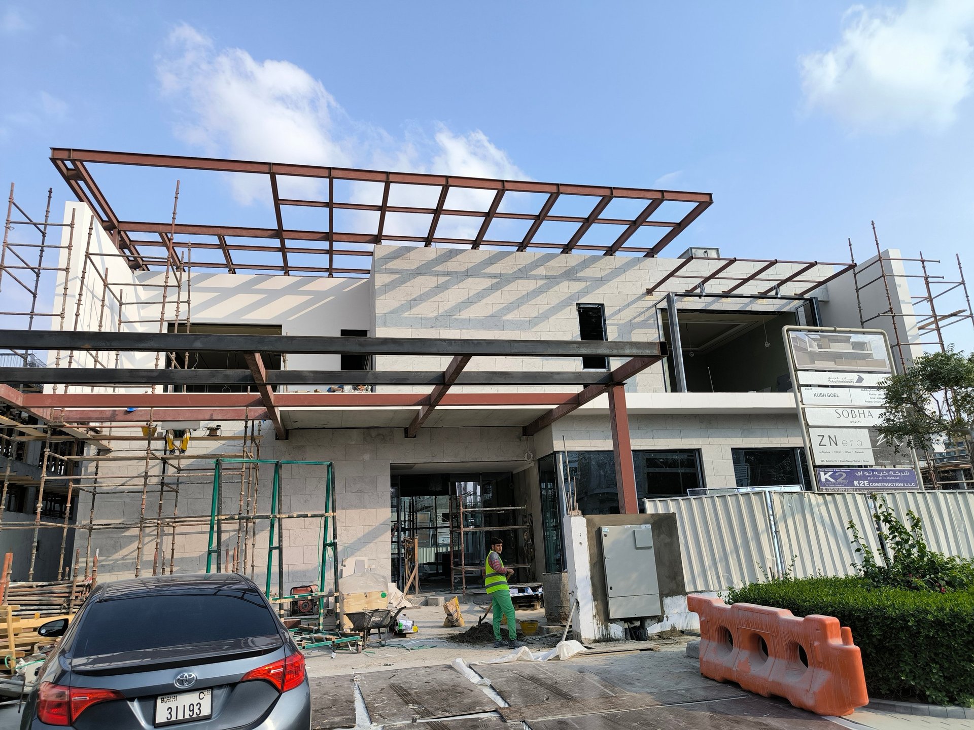 Structural steel framework fabrication and site installation for a modern villa elevation in Dubai.