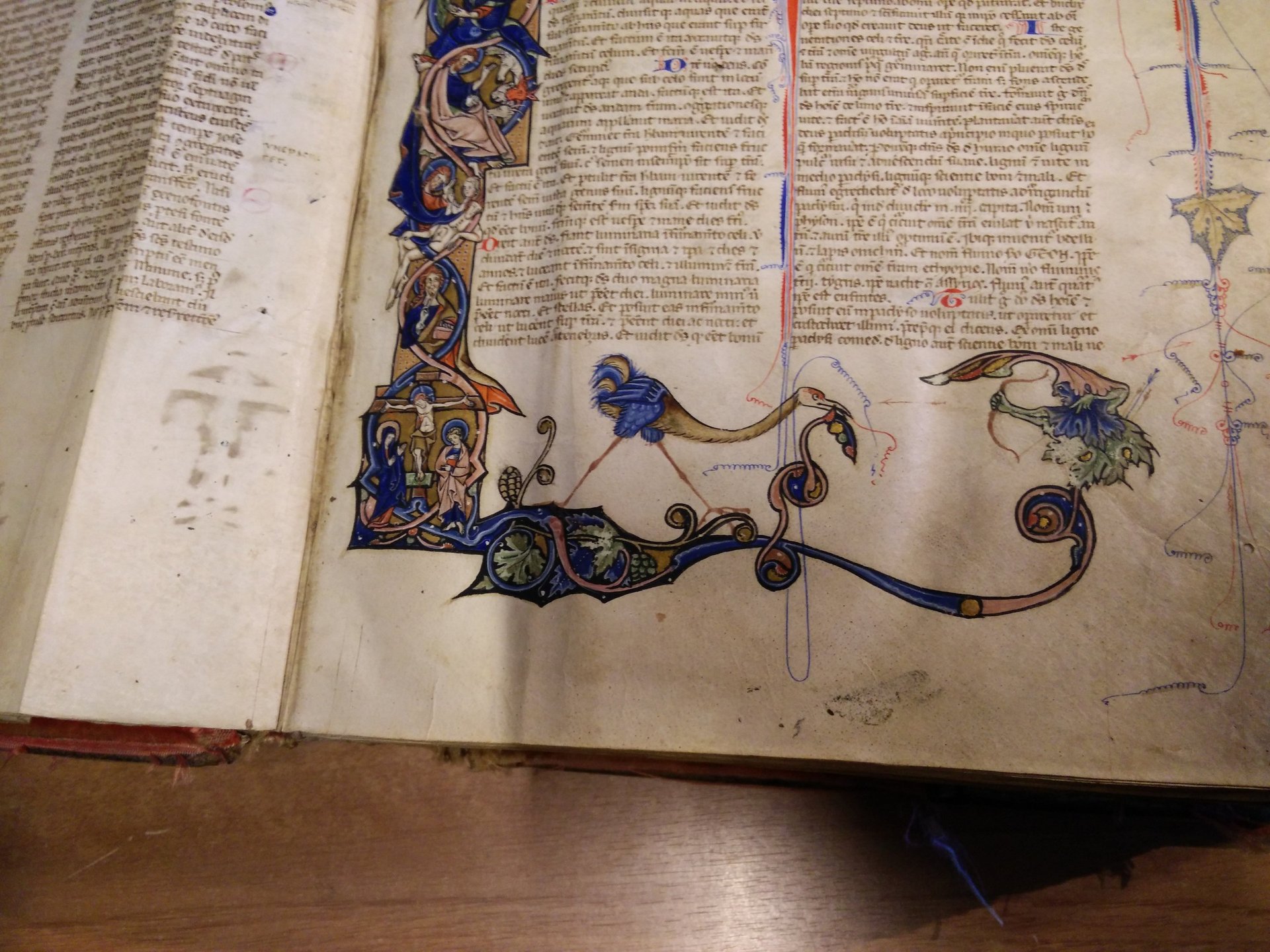 A lavishly decorated page of a bible, 13th Century, Italy.