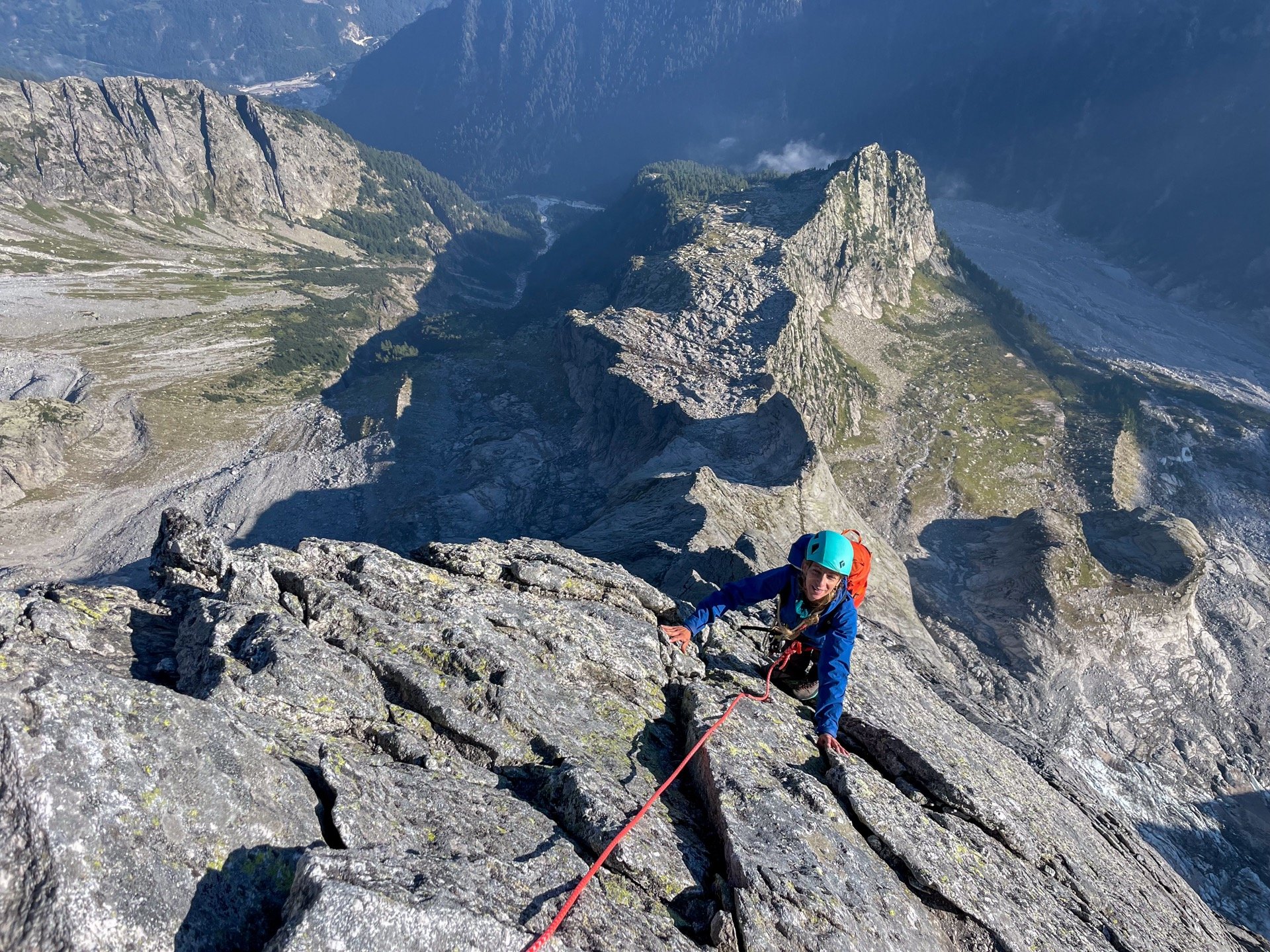 Climbing in the sun — High on the north ridge of Piz Badile.
