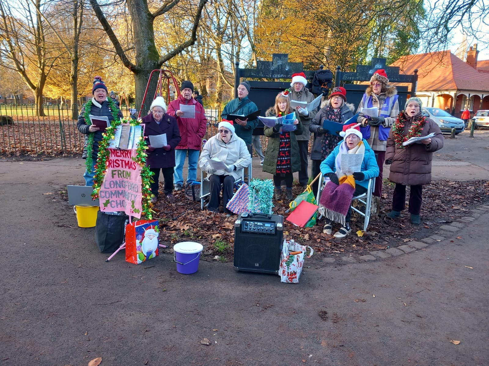 The Choir singing carols in Longford Park