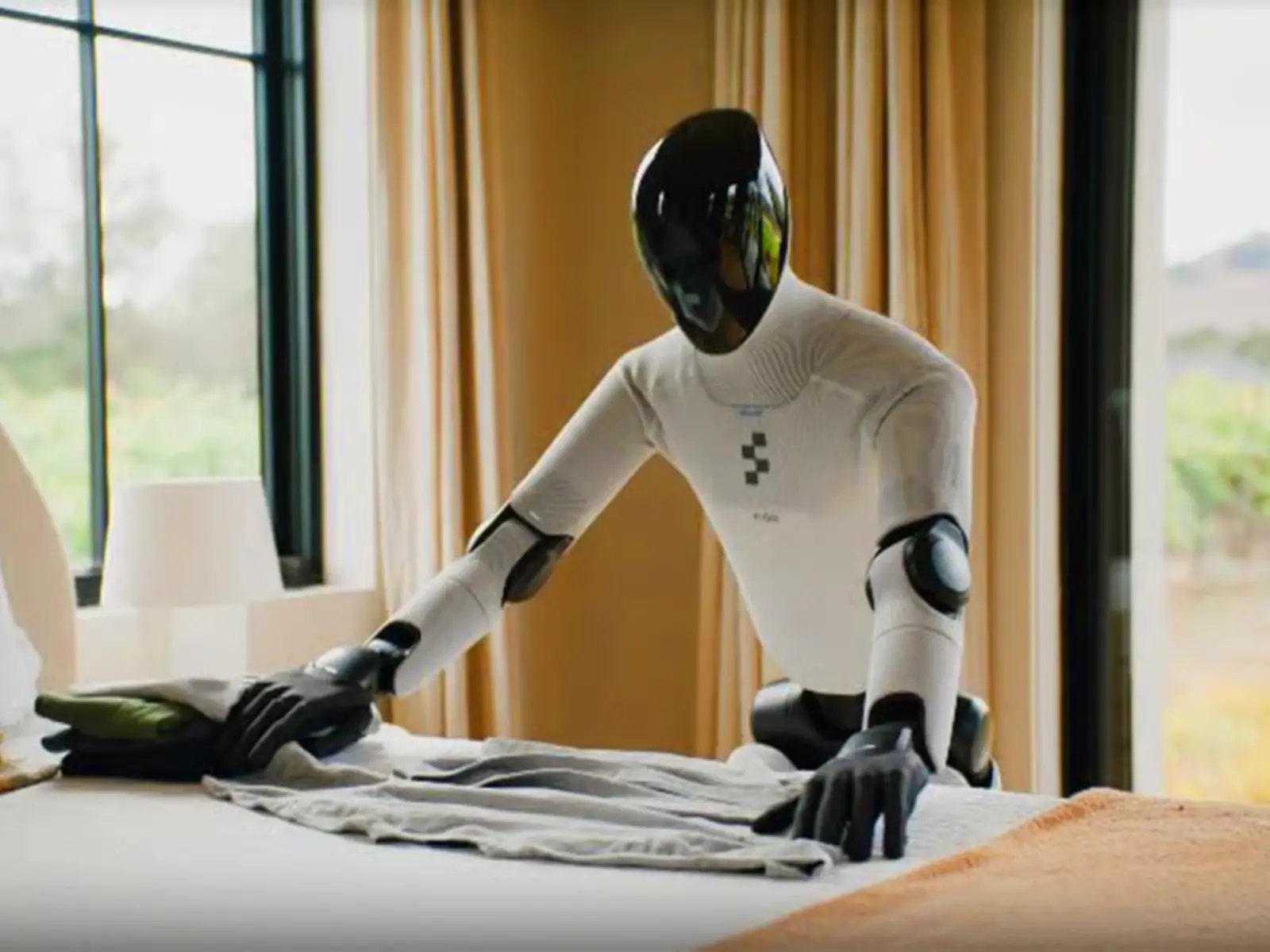 Detalle de los brazos robóticos con IA física durante una reparación en el taller de MBTECNIC.