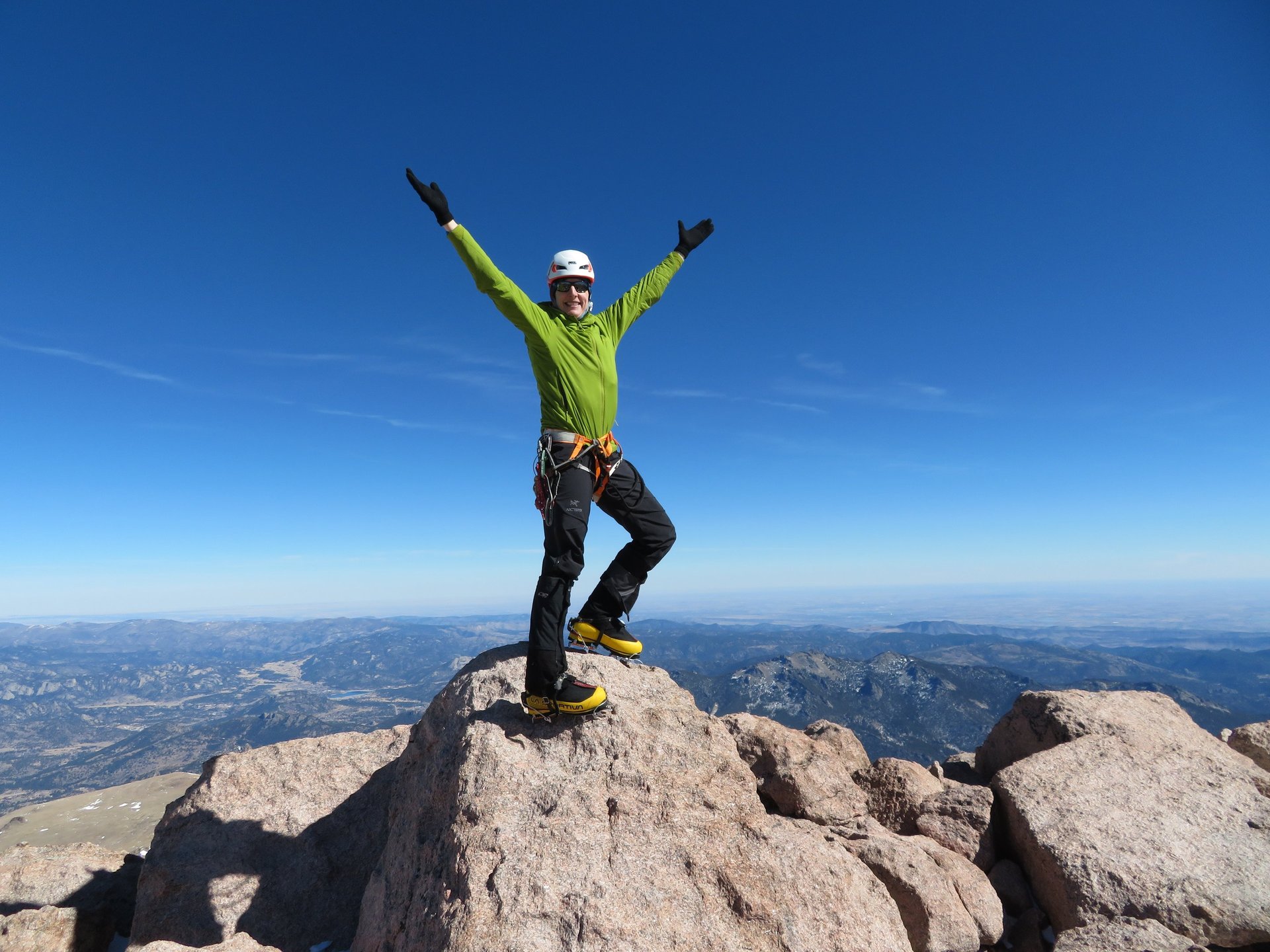 Lisa Foster on the "summit rock" on Longs Peak. This climb put her in the historical 5th place for successul summits of Longs
