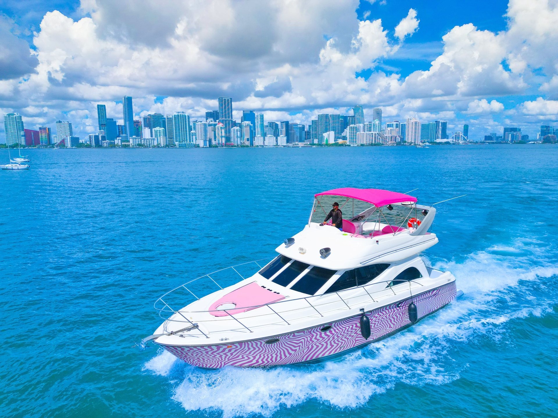 Pink yacht rental in Miami 46FT Maxum Flybridge for party and bachelorette celebration