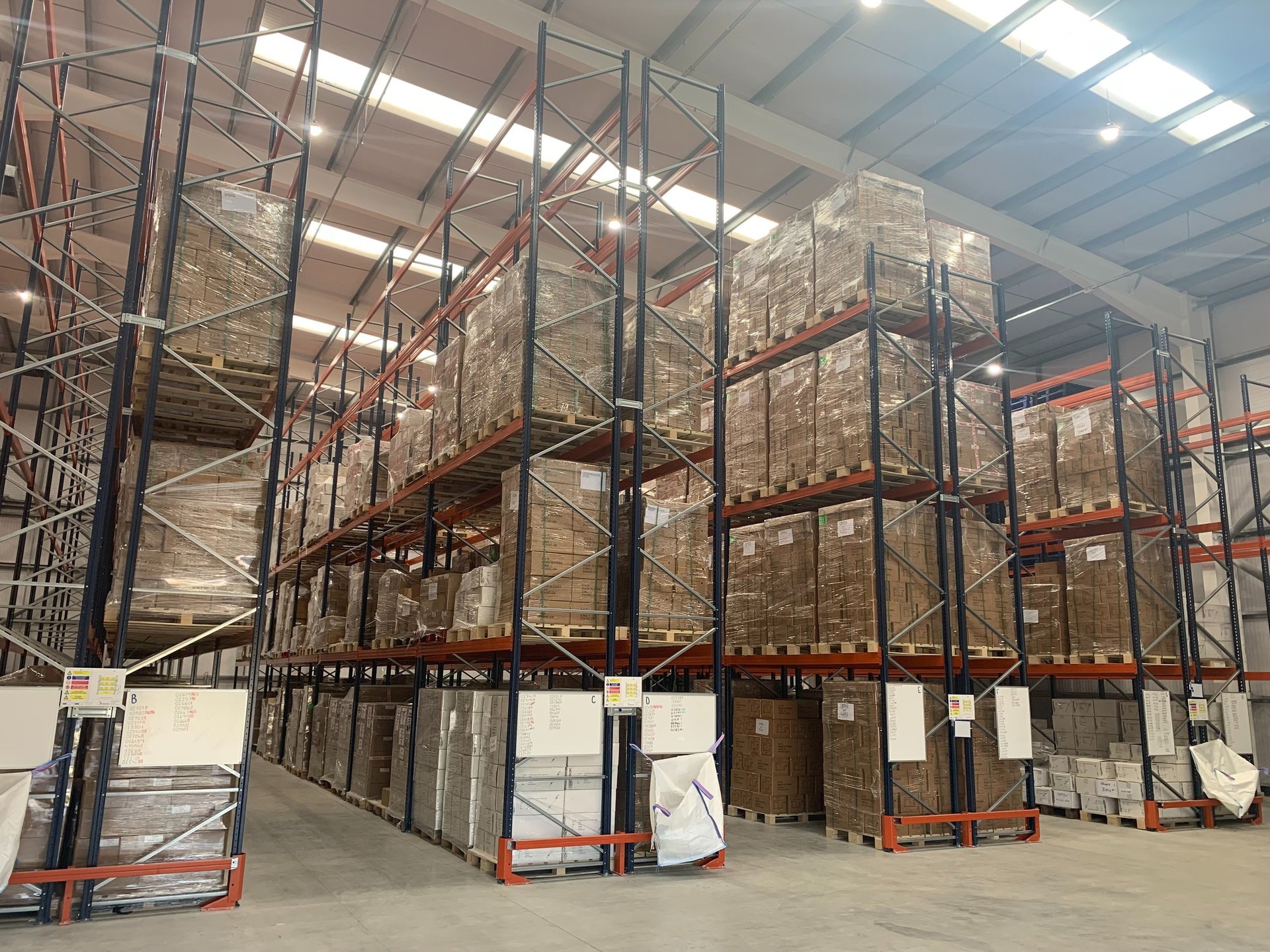 tall pallet racking in narrow aisle configuration with rack end protectors  