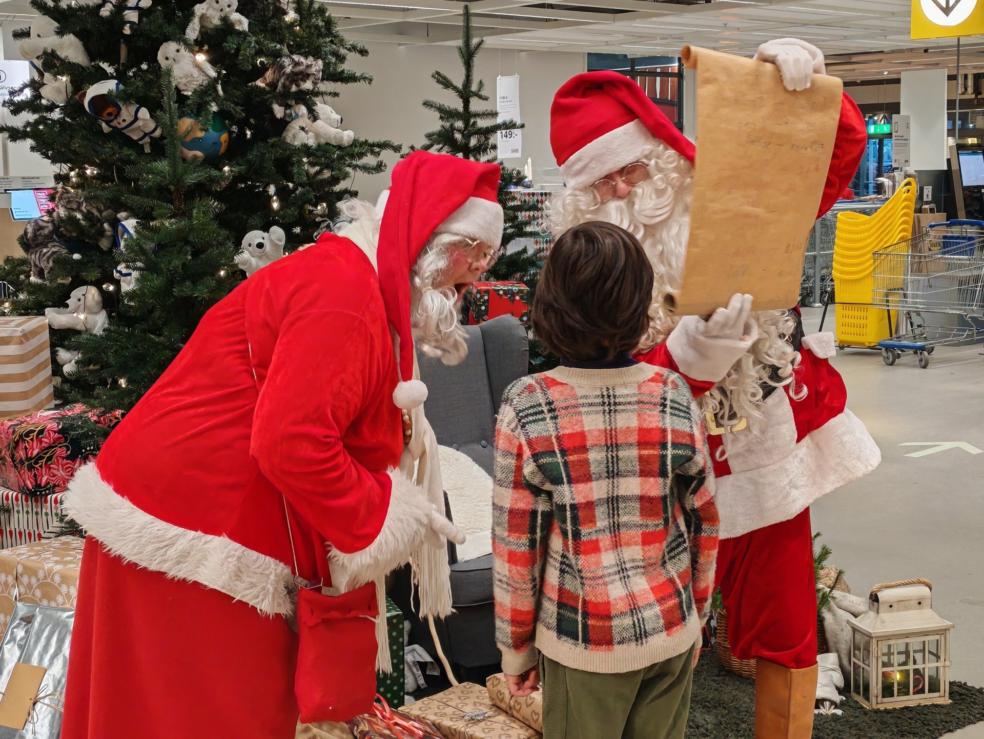 Santa Claus greeting a child at Nature Dream Days Christmas Village