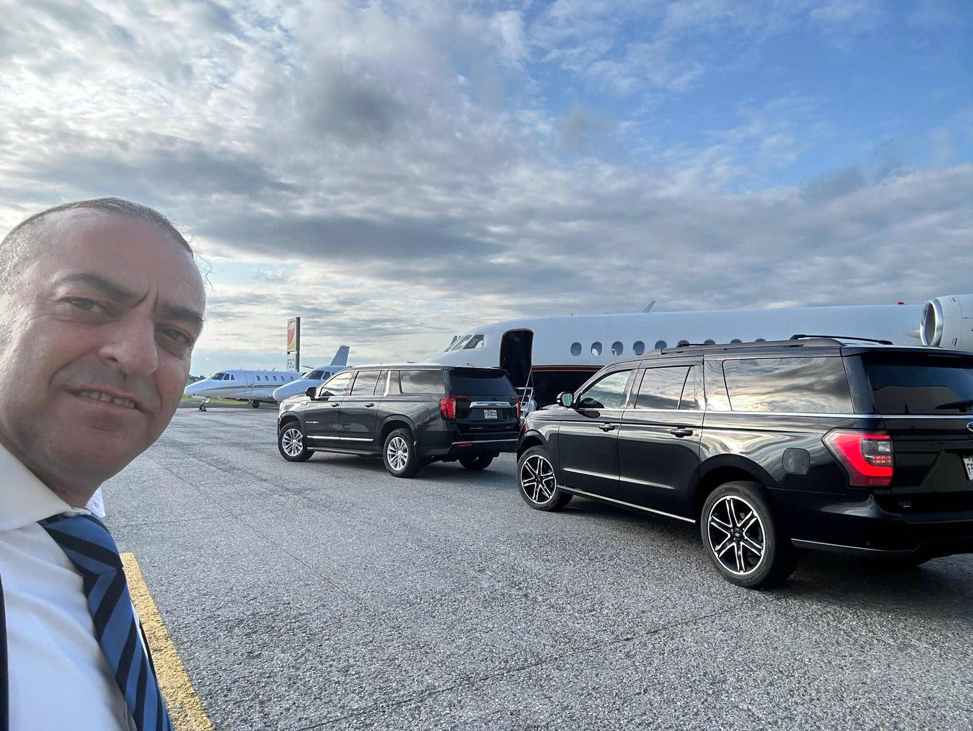 emilios limo standing in front of a plane