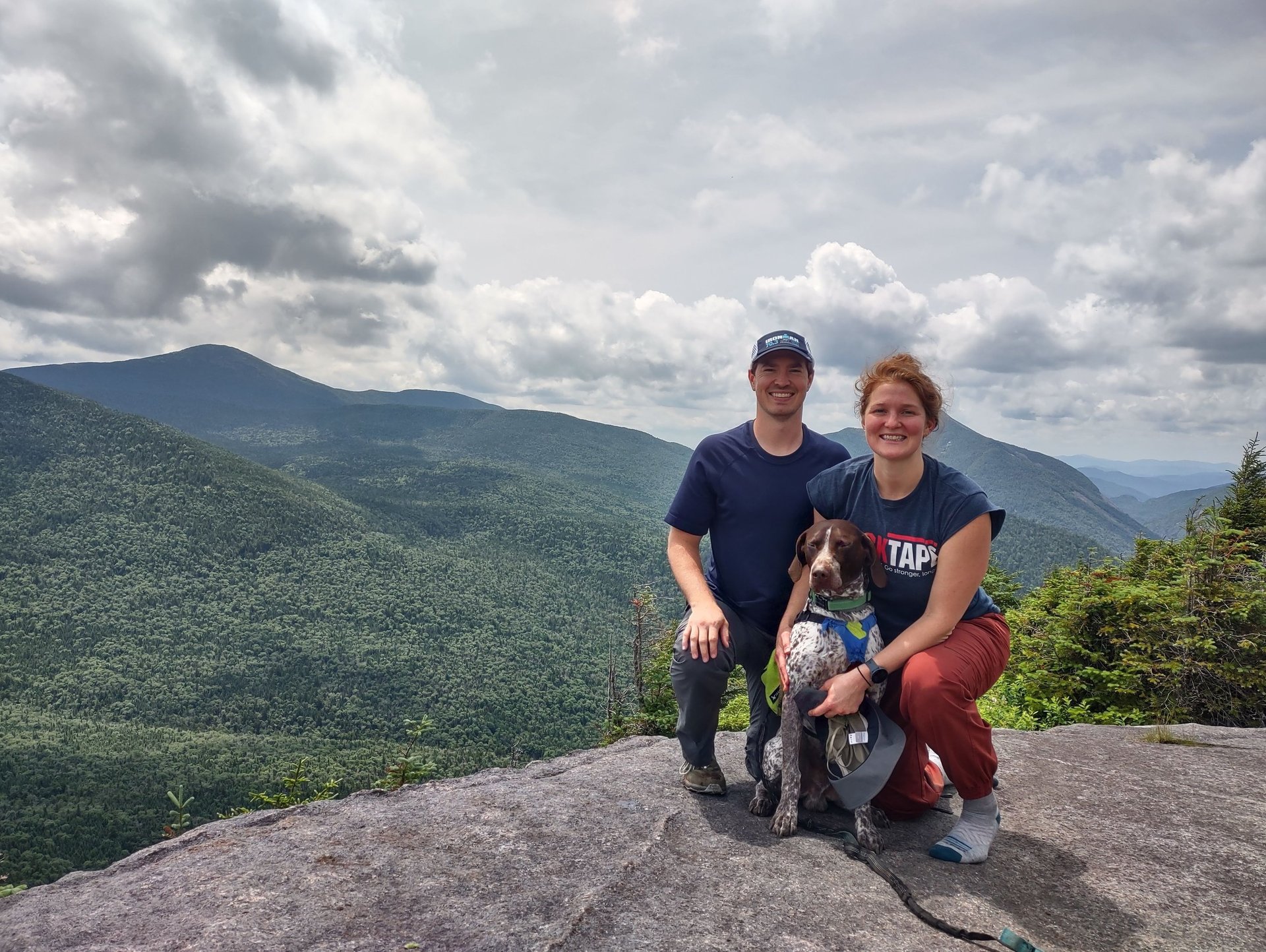Logan Yerger and Suzanne Colesar Yerger on a hike with their dog