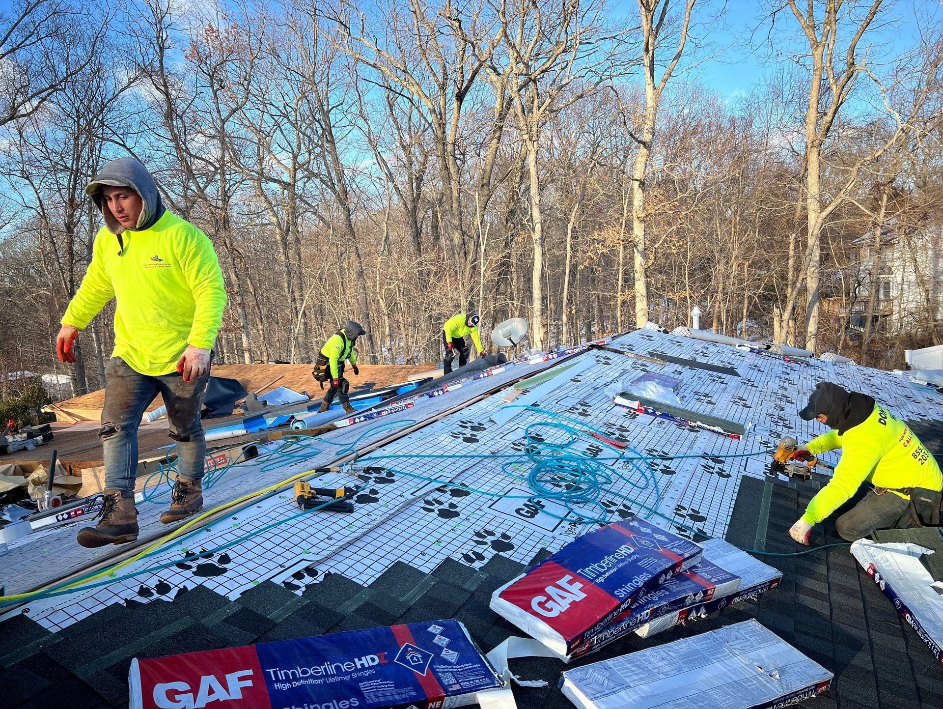 Happy homeowner after roof repair by EagleView Restoration.