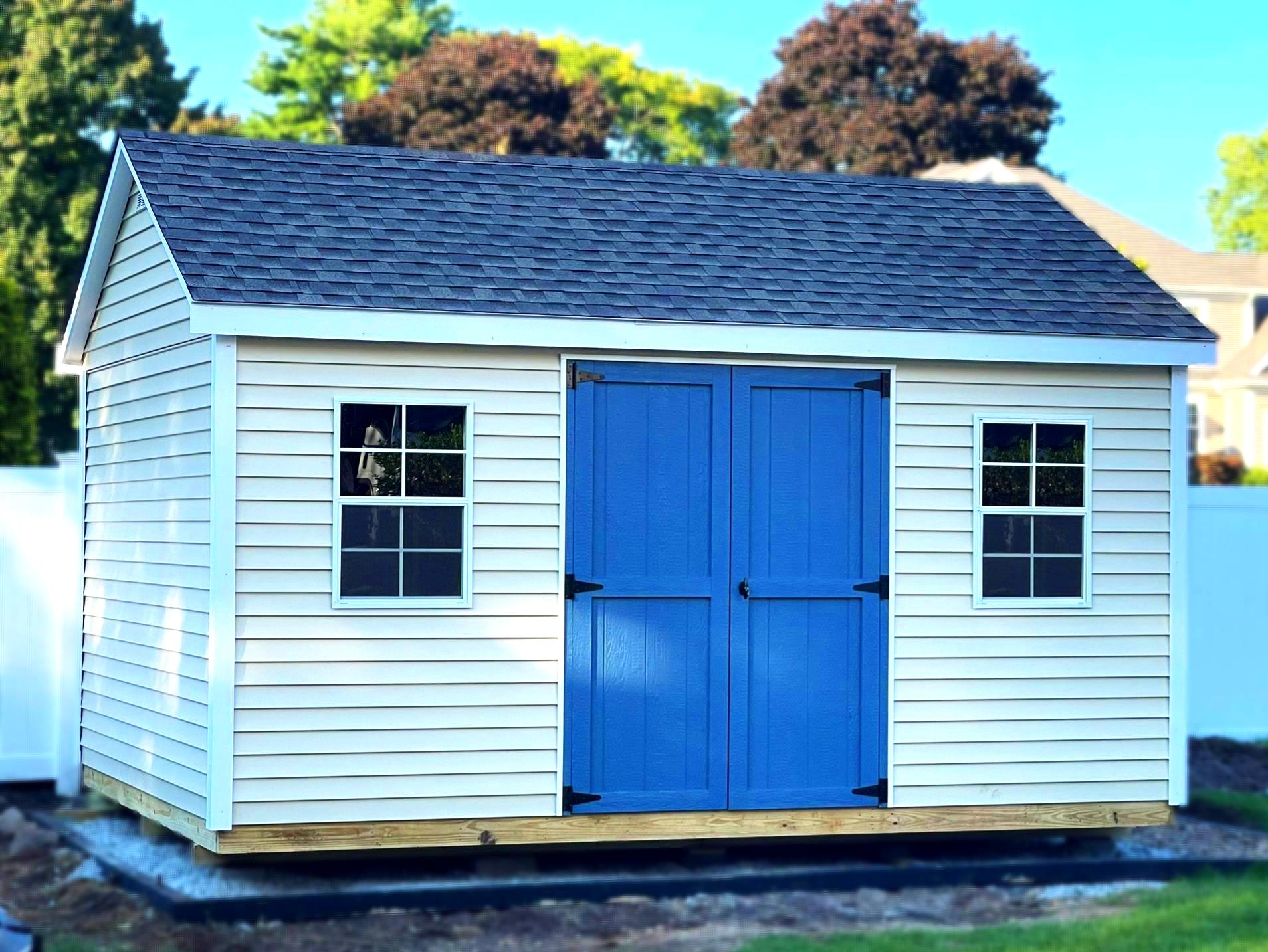 Shed with extended roof overhang built in Massachusetts featuring premium craftsmanship and clean design.