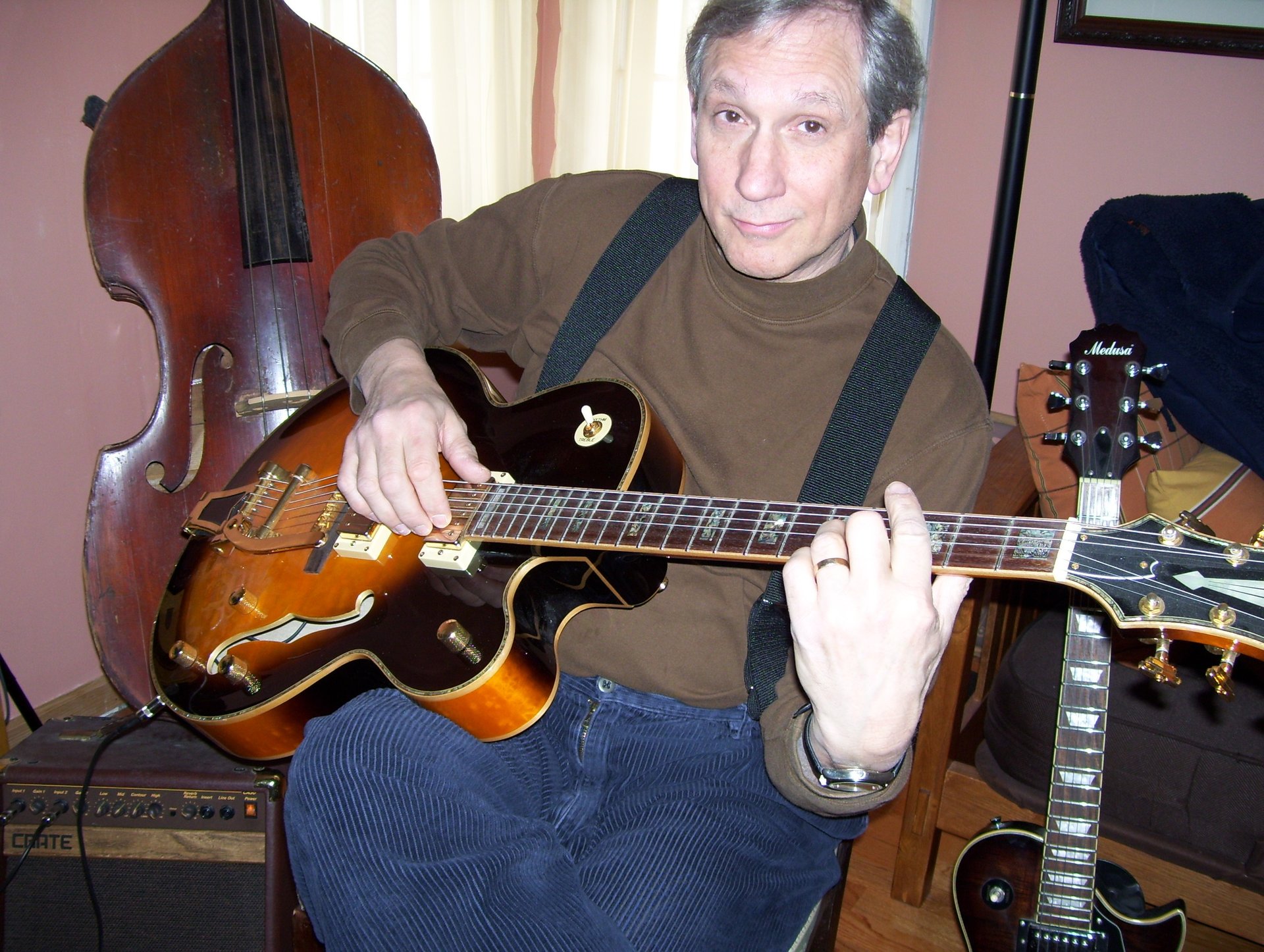 Bob Bushnell with guitar for private guitar lessons in Hopkins, Minnesota